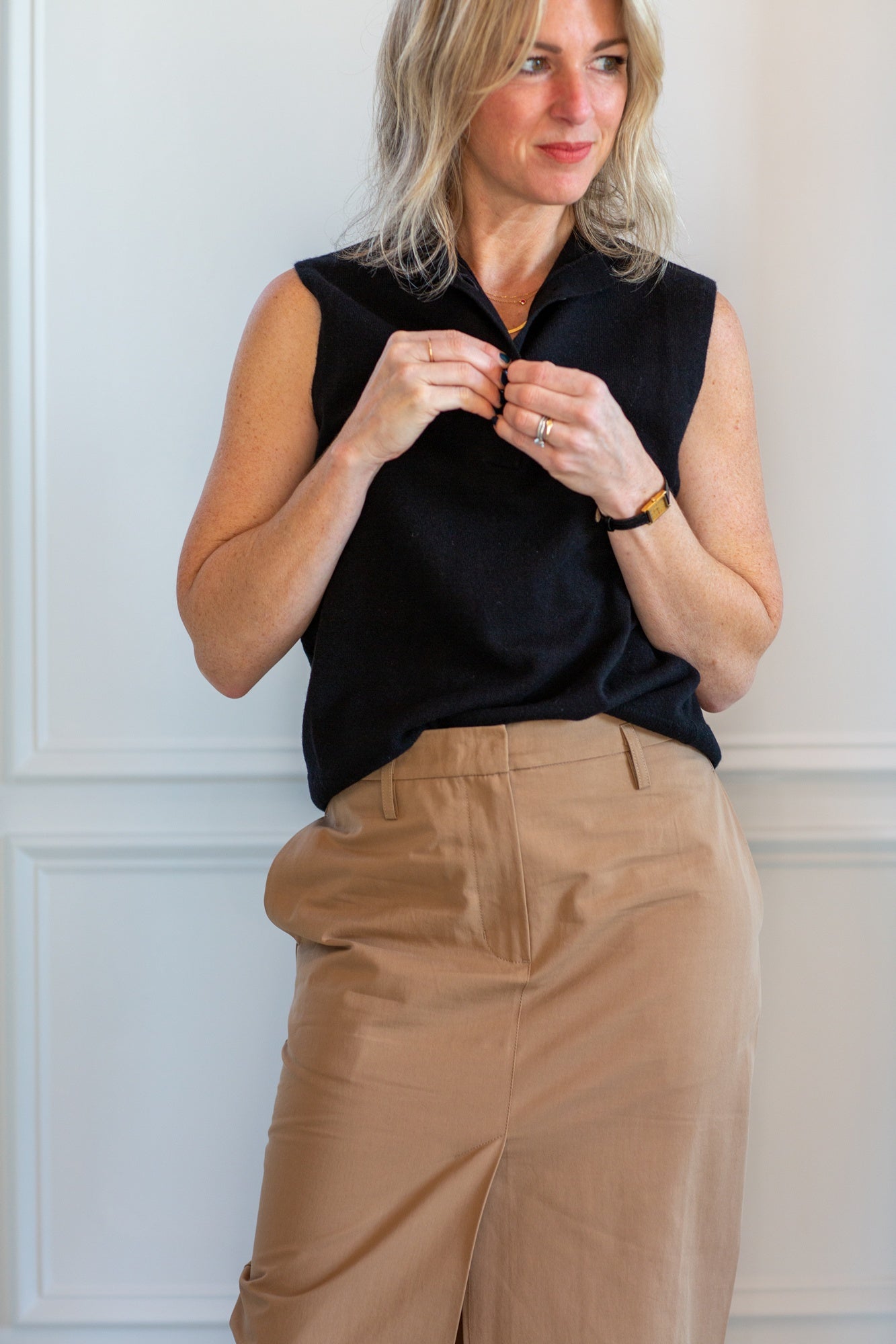 model wearing the Herskind grace skirt and house of dagmar sleeveless cashmere top