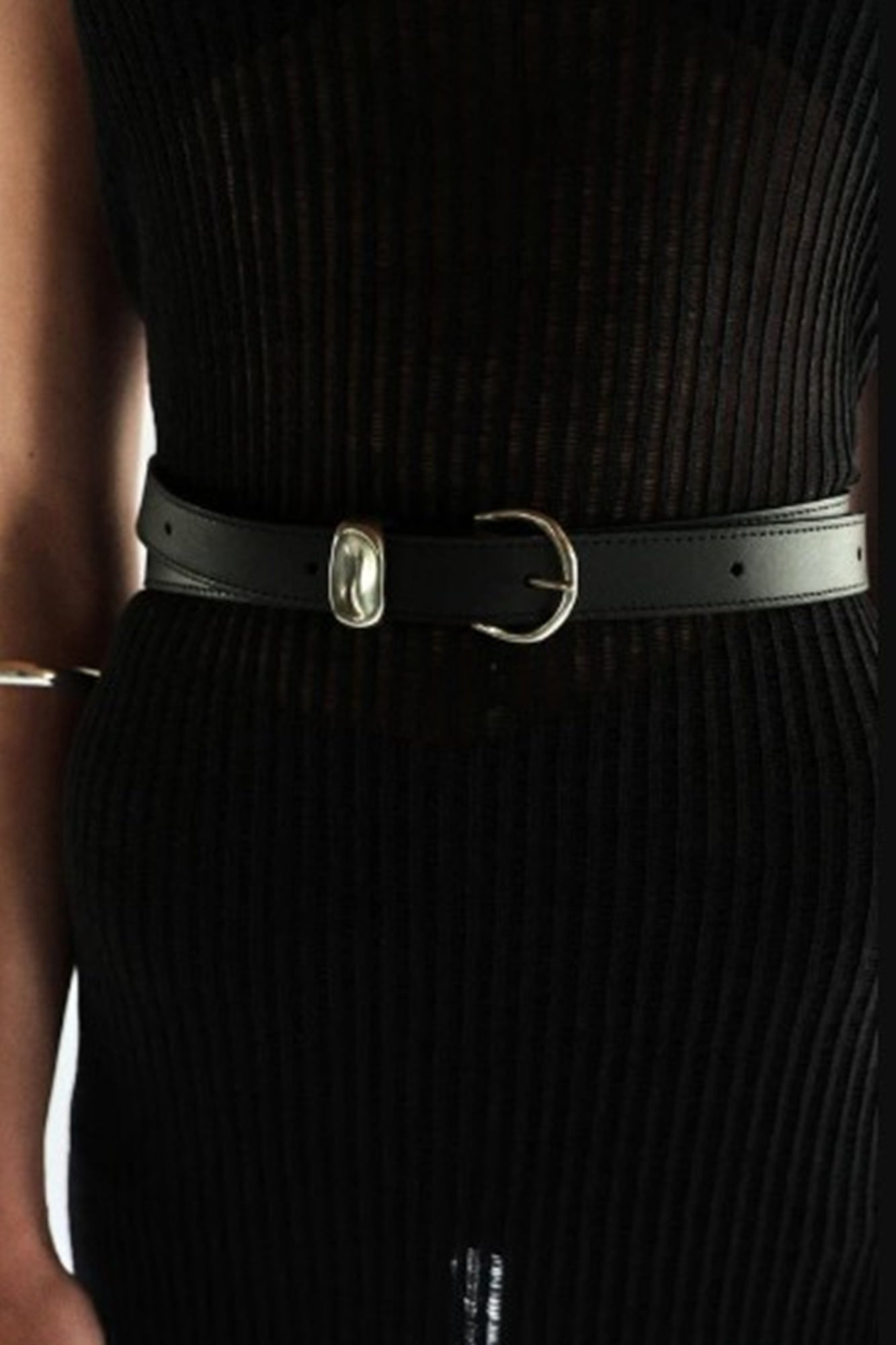 model wearing the janessa leone myra belt in black