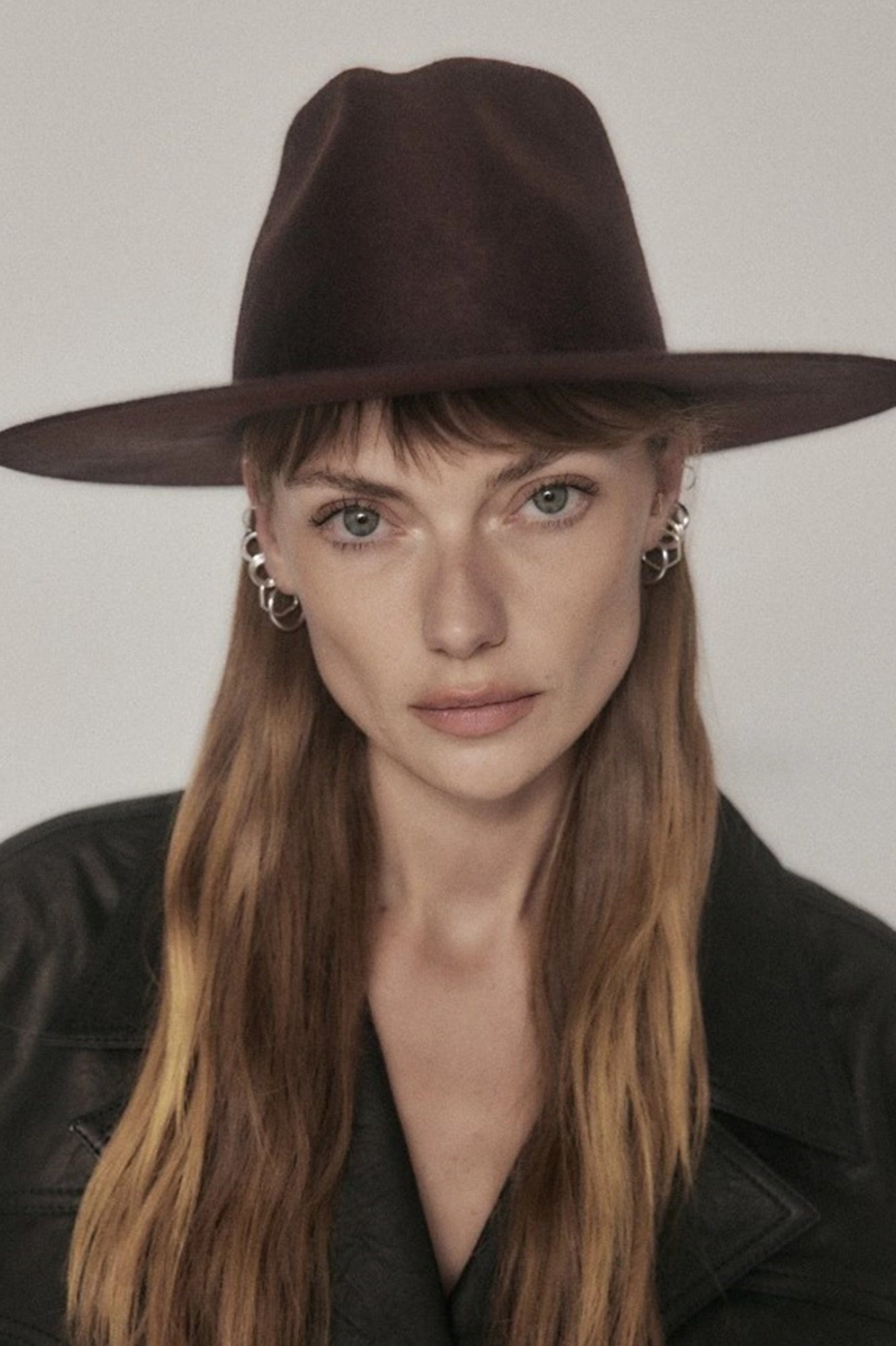 model wearing the janessa leone sabina hat in burgundy