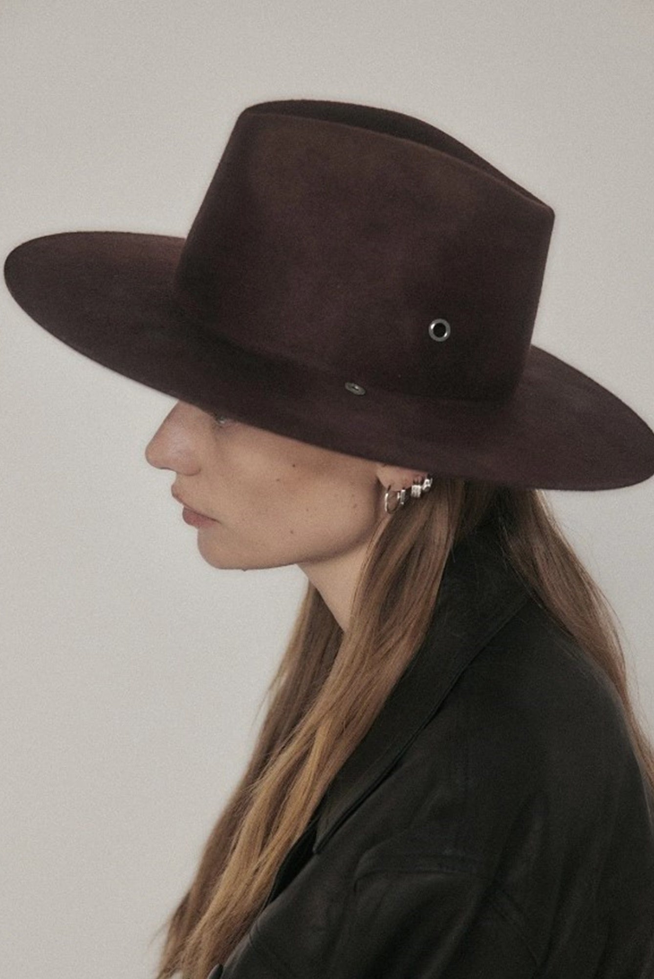 model wearing the janessa leone sabina hat in burgundy
