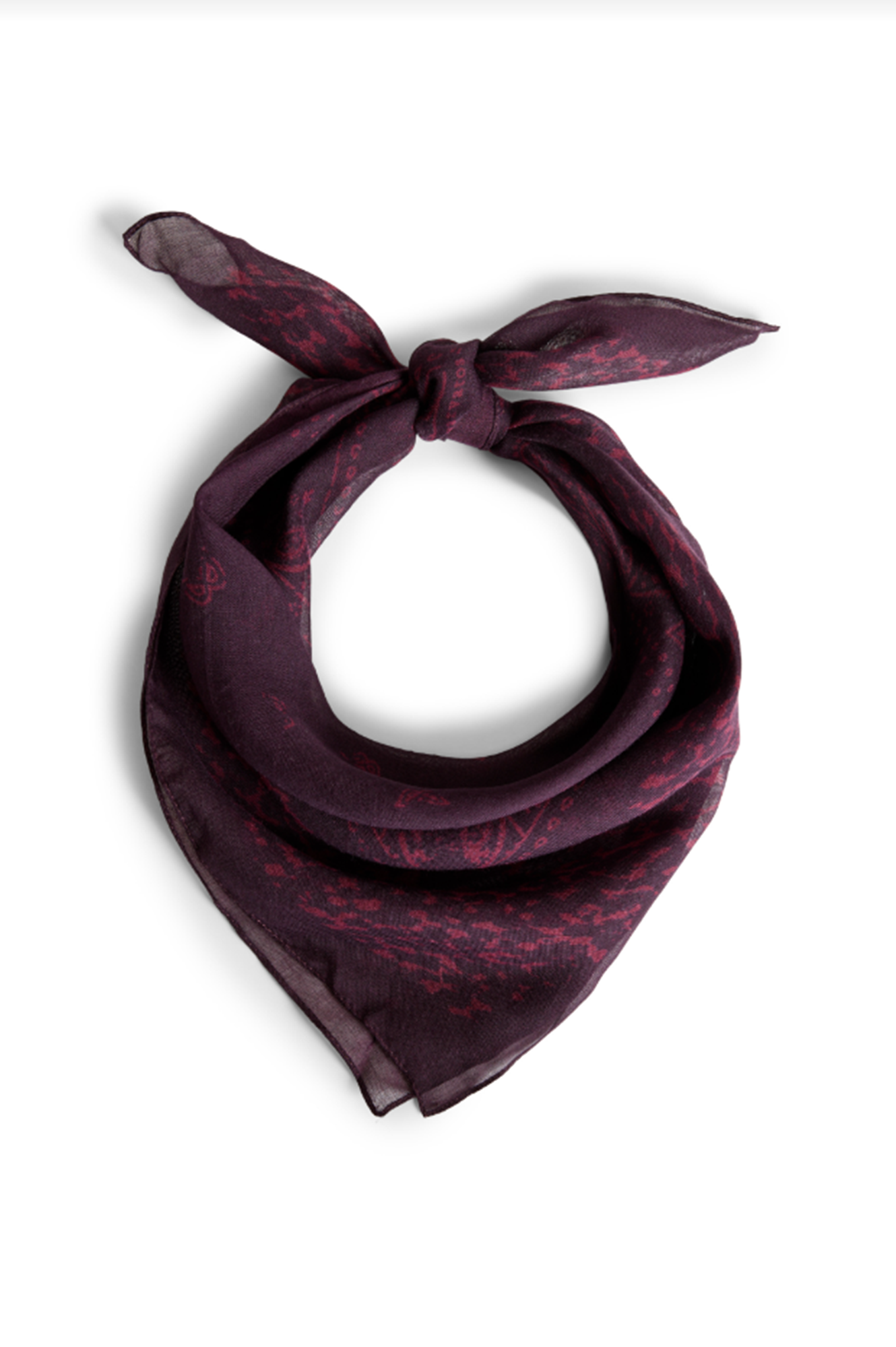 Oxblood patterned scarf tied into a knot on a white background