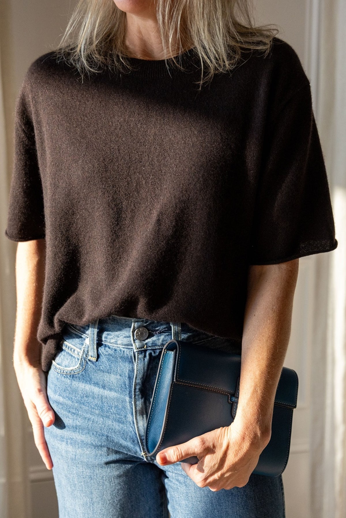Lisa Yang Cila T-Shirt in dark oak cashmere, boxy short sleeves, styled with AMO Frida jeans