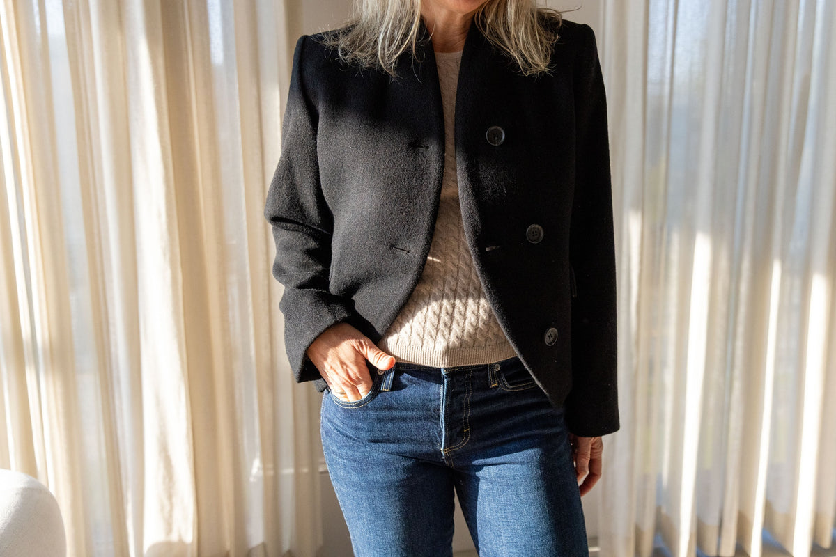 Lisa Yang Iora Top in sand cable knit layered under the Dagmar short curved jacket with AMO 143 jeans