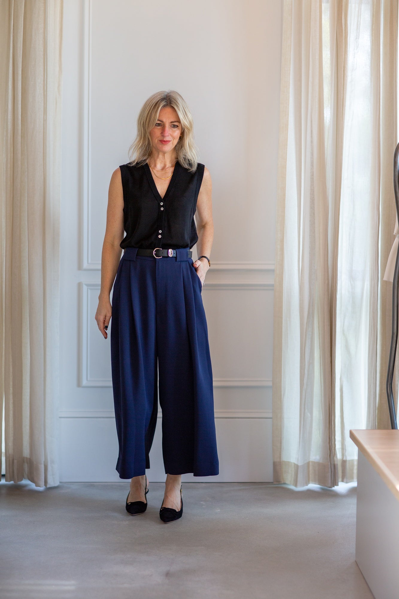 model wearing the marle foundations vest and rachel comey wolcott pants