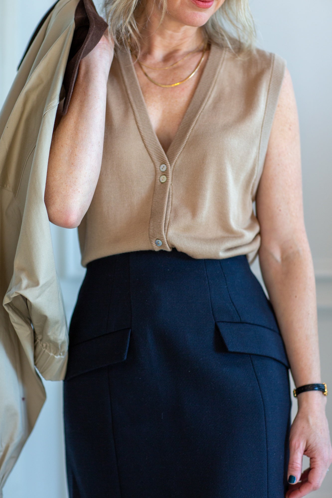 model wearing the Marle foundations vest in almond with the herskind benjamin skirt