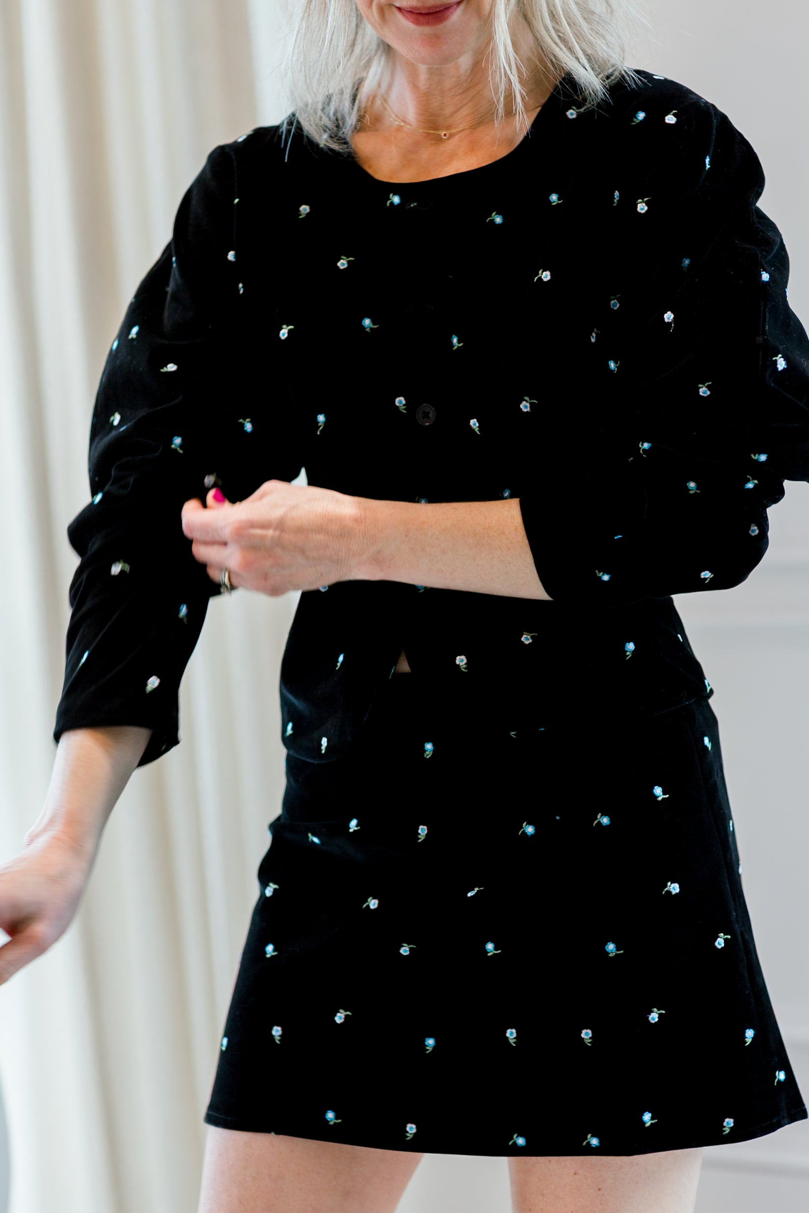 image of a woman wearing the marlies grace jackie skirt and jacket