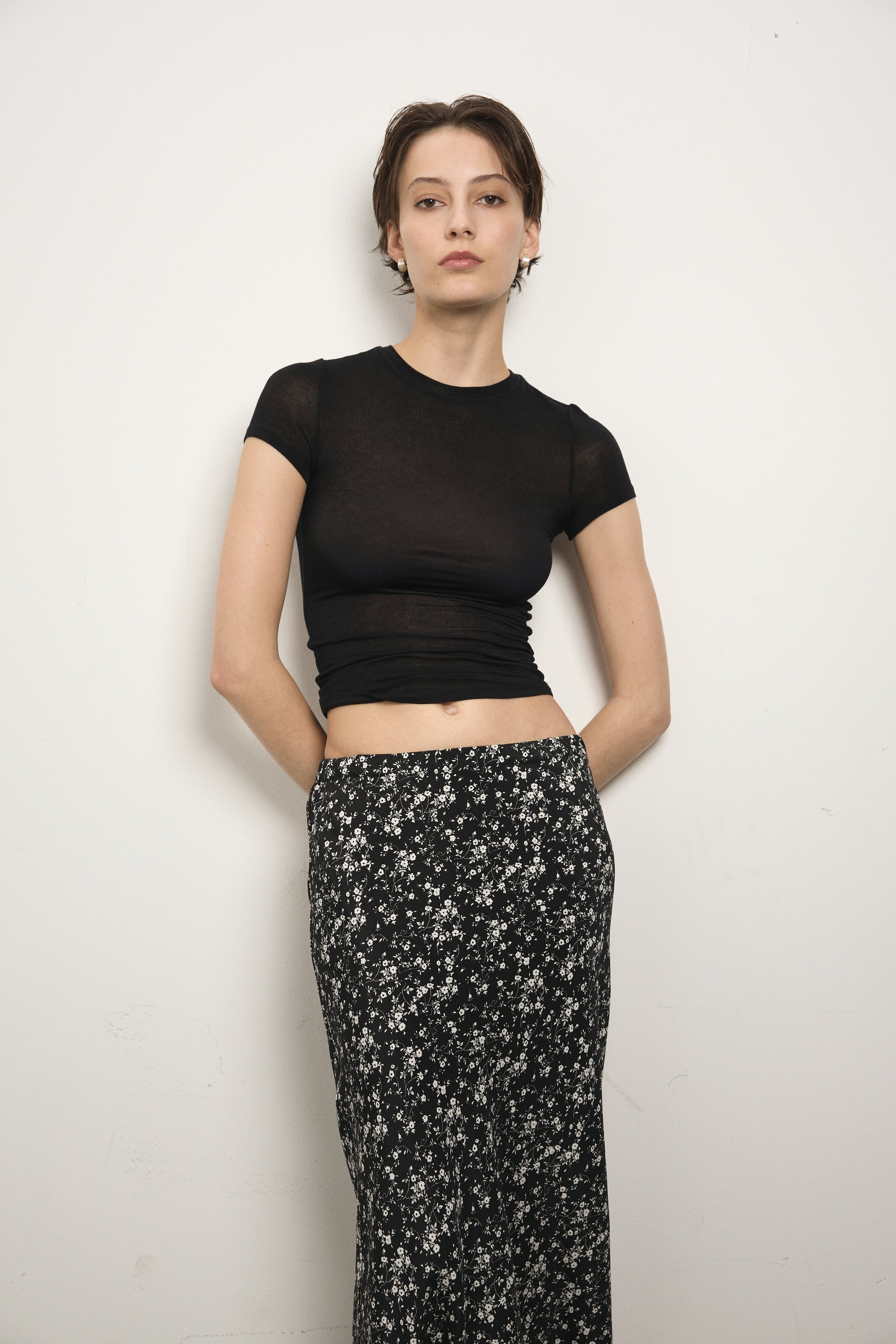 image of a model wearing the Paris Georgia Bias Half Zip Skirt