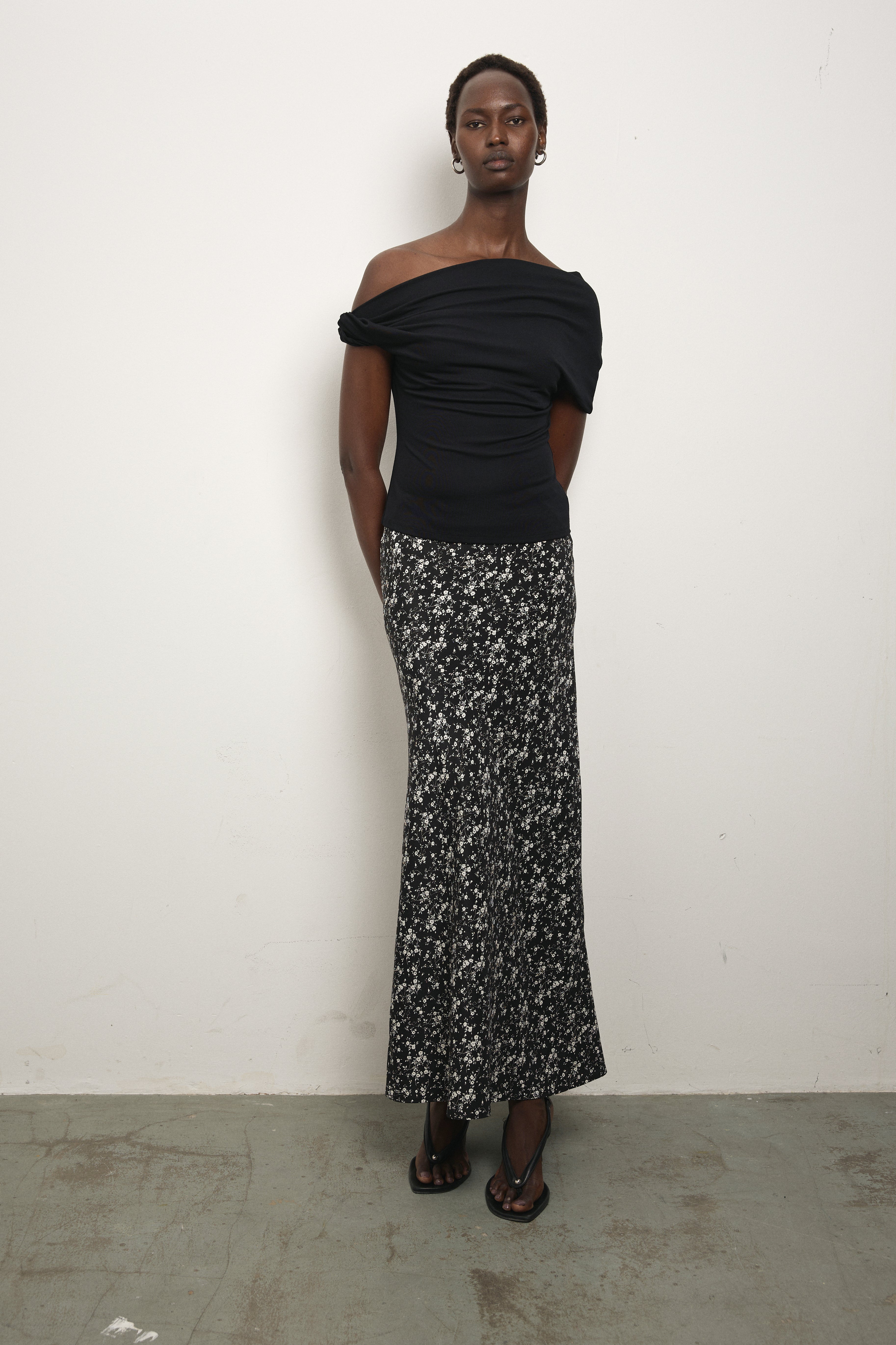 image of a model wearing the Paris Georgia Bias Half Zip Skirt