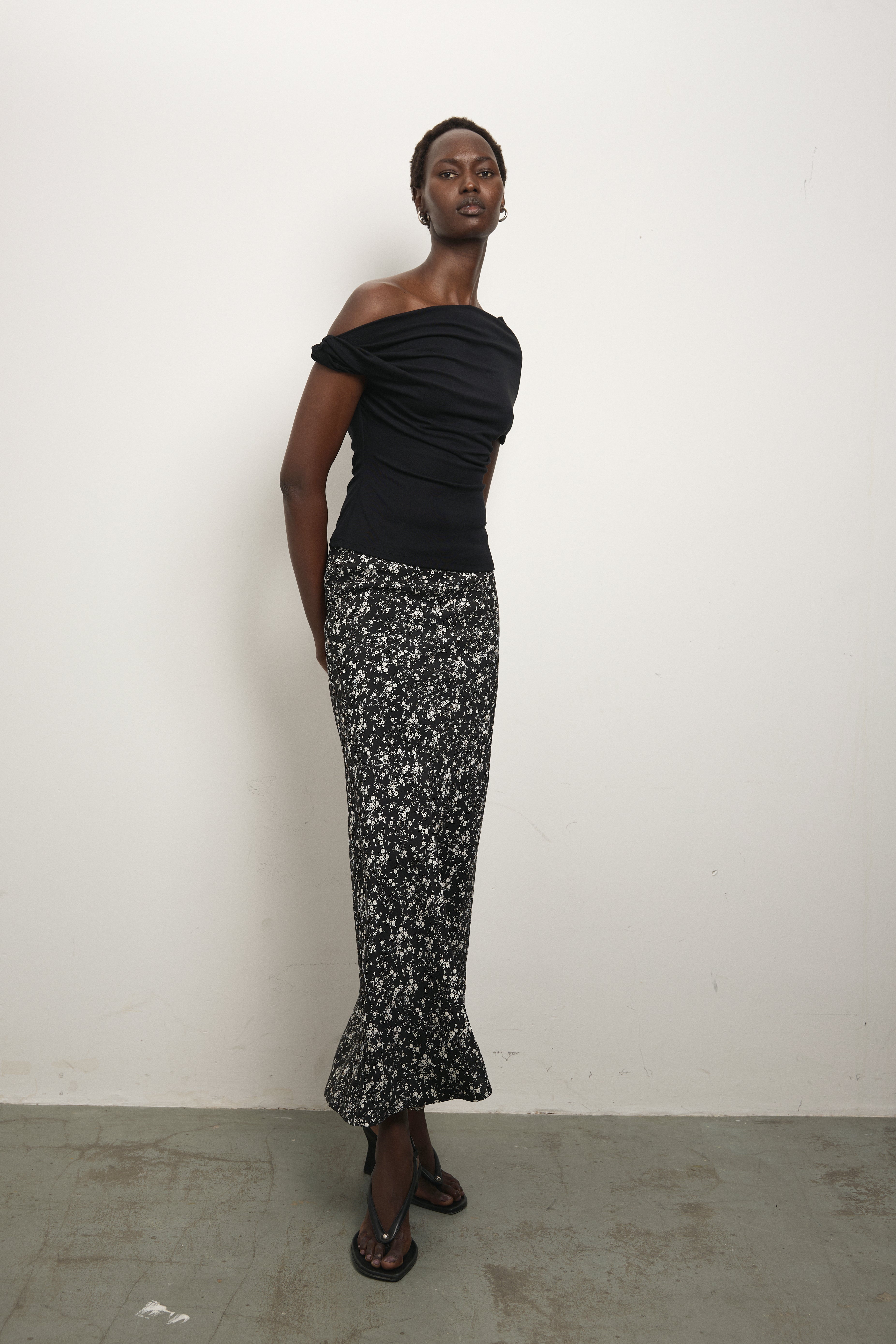 image of a model wearing the Paris Georgia Bias Half Zip Skirt
