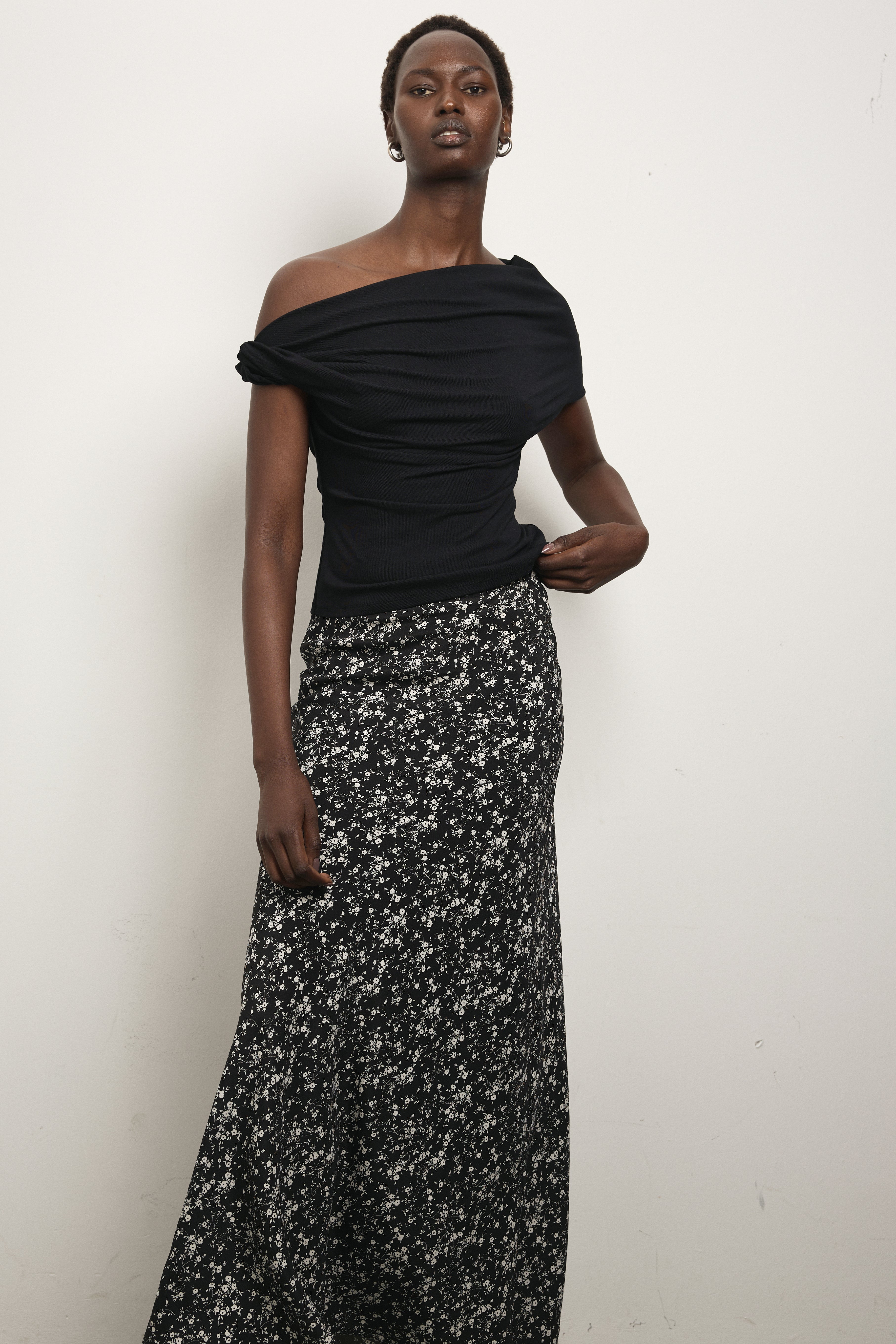 image of a model wearing the Paris Georgia Bias Half Zip Skirt
