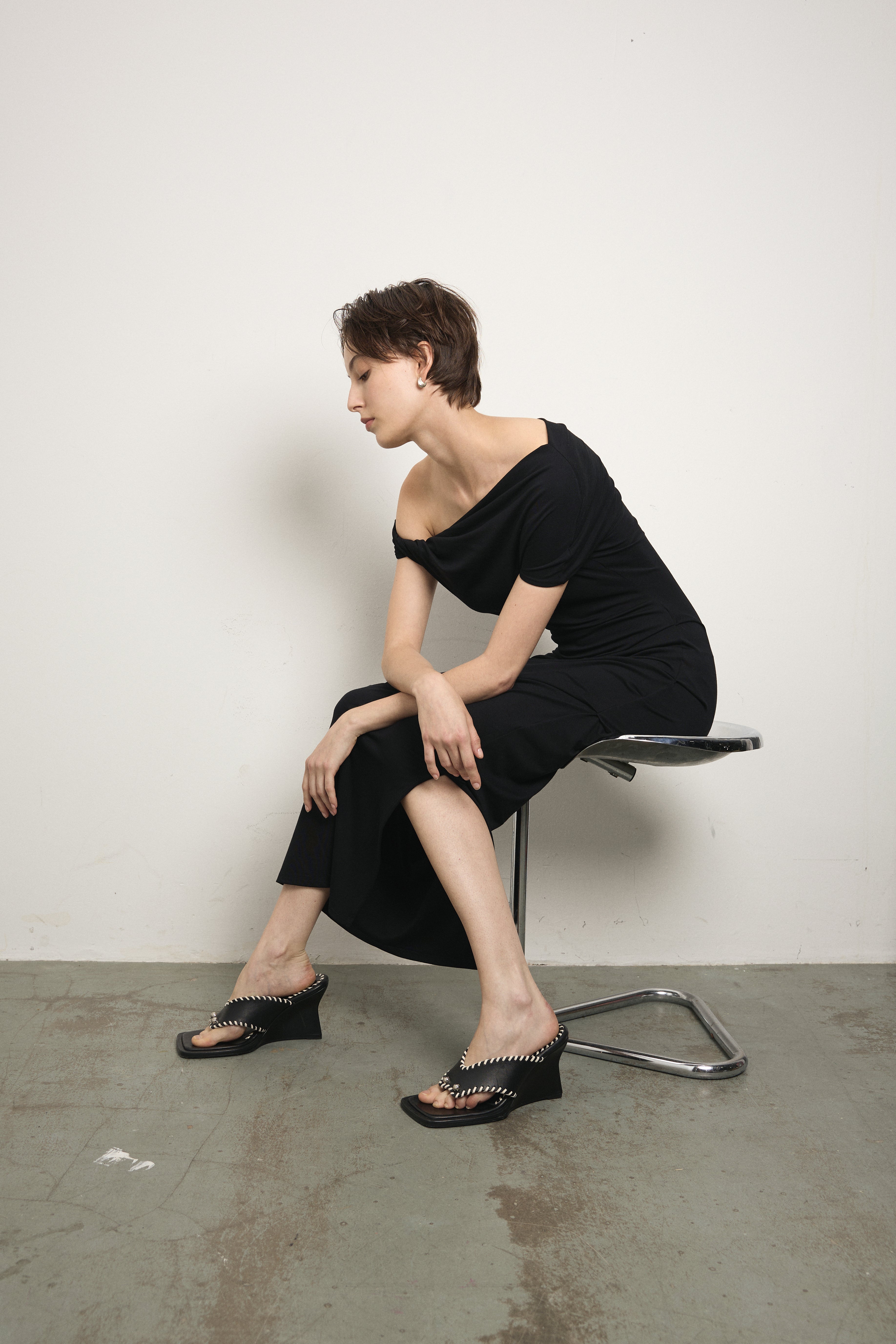 image of a woman wearing the Paris Georgia Ida dress in black