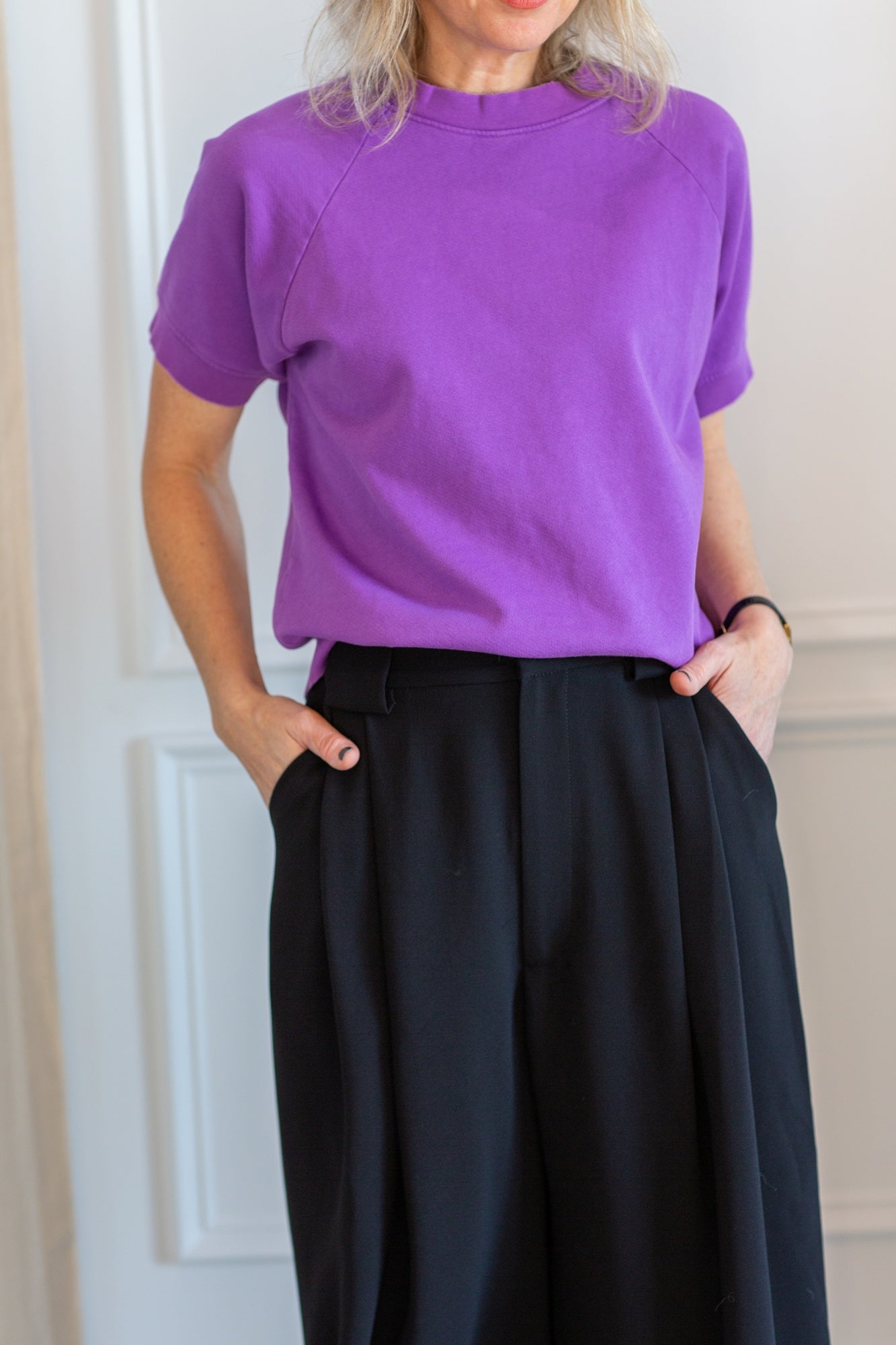 model wearing the rachel comey billi sweatshirt and wolcott pants