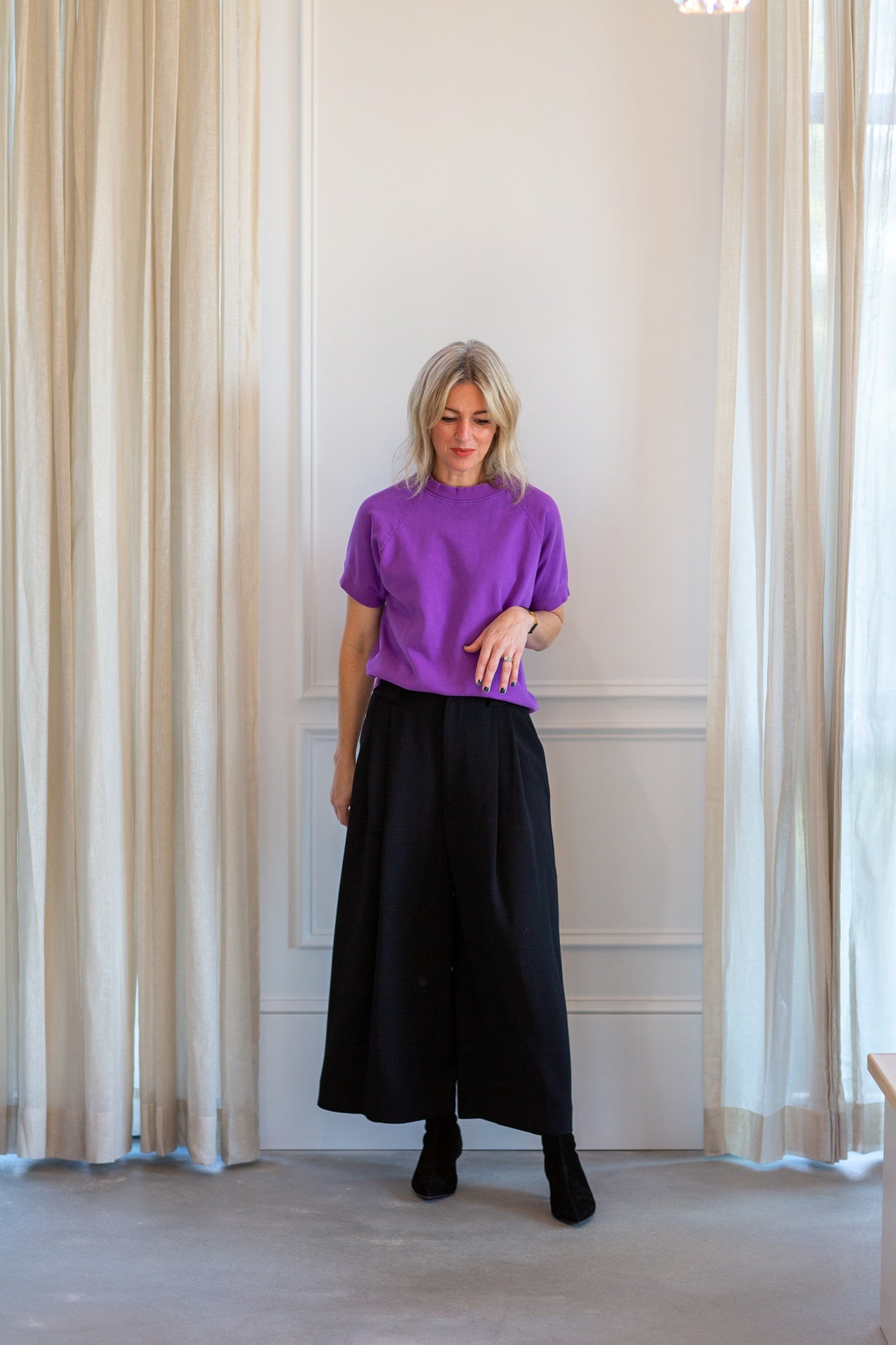 model wearing the rachel comey billi sweatshirt and wolcott pants