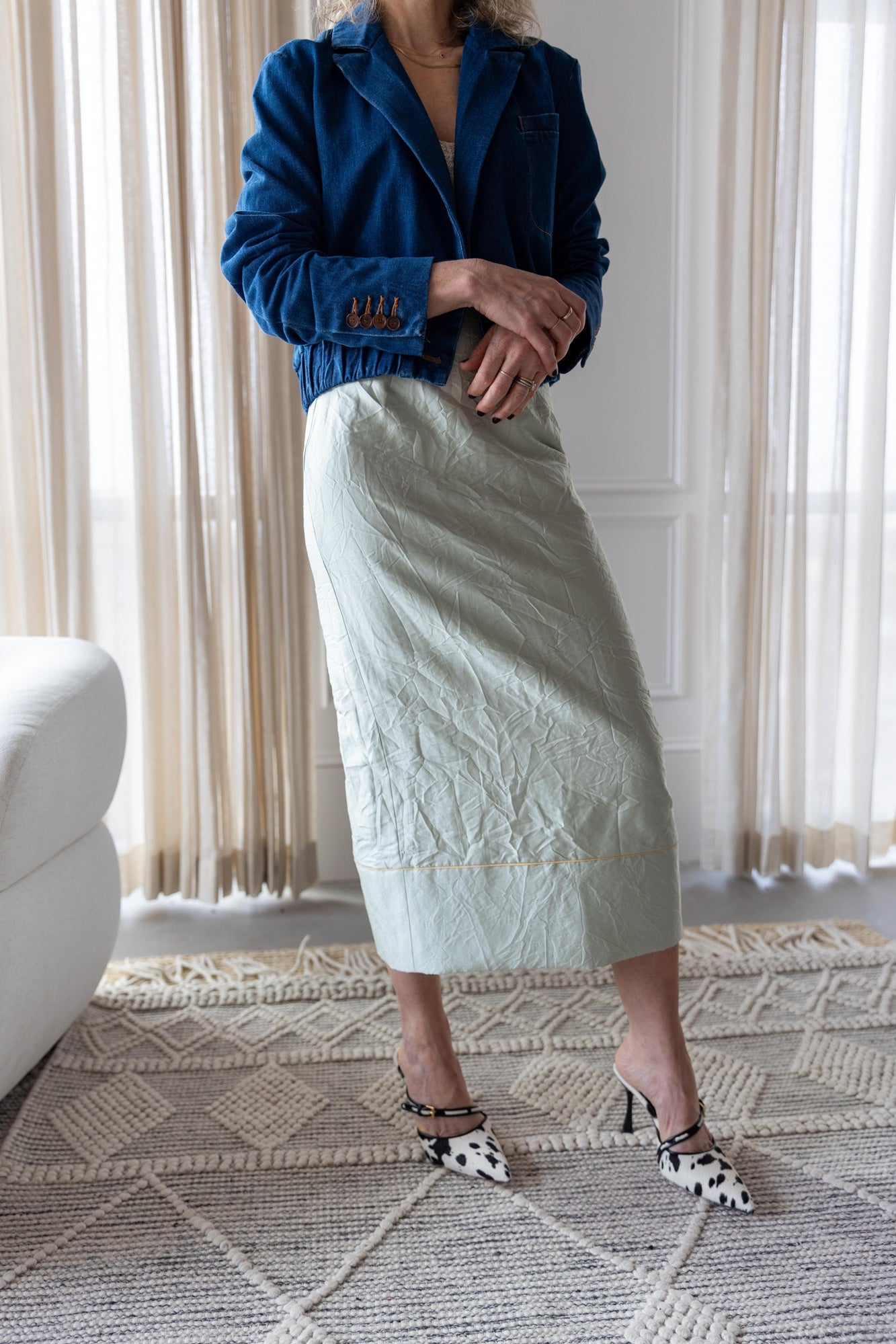 image of a woman wearing the Rachel Comey Grain Jacket and Vick Skirt