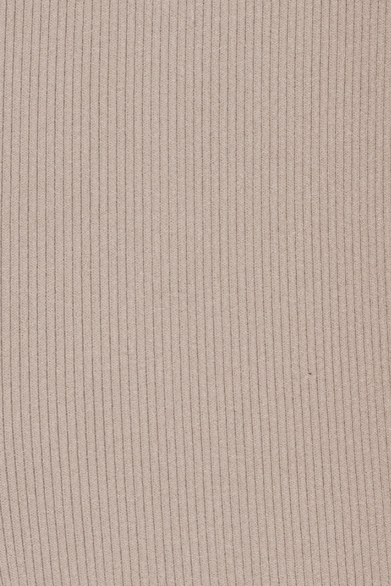 Close up of rib knit trousers