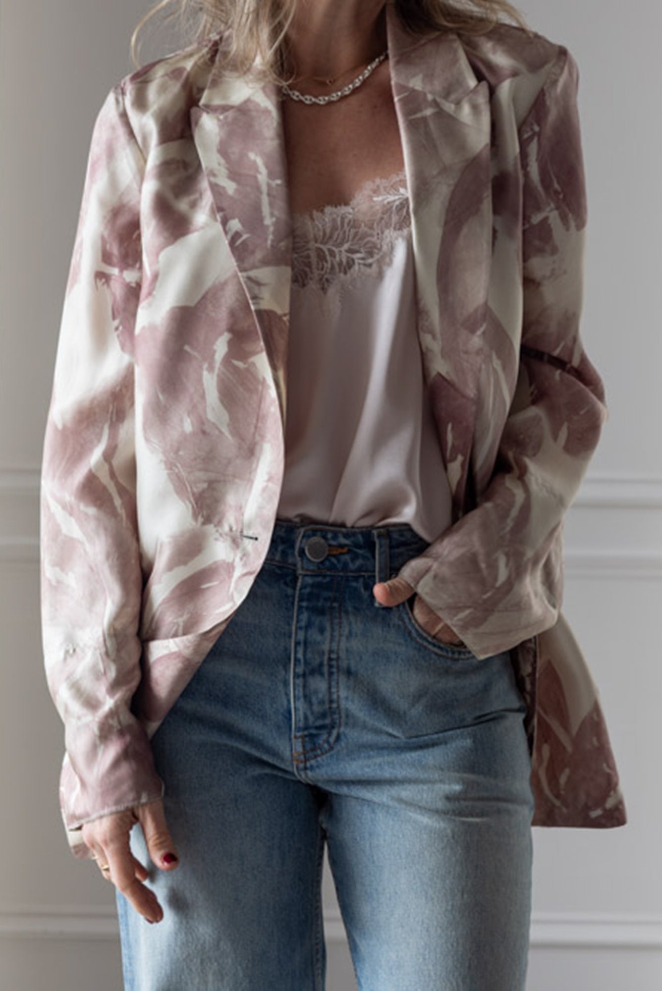 image of a woman wearing the Alysi Brushed print jacket with the Sablyn Bobbi cami and Sammy Jeans