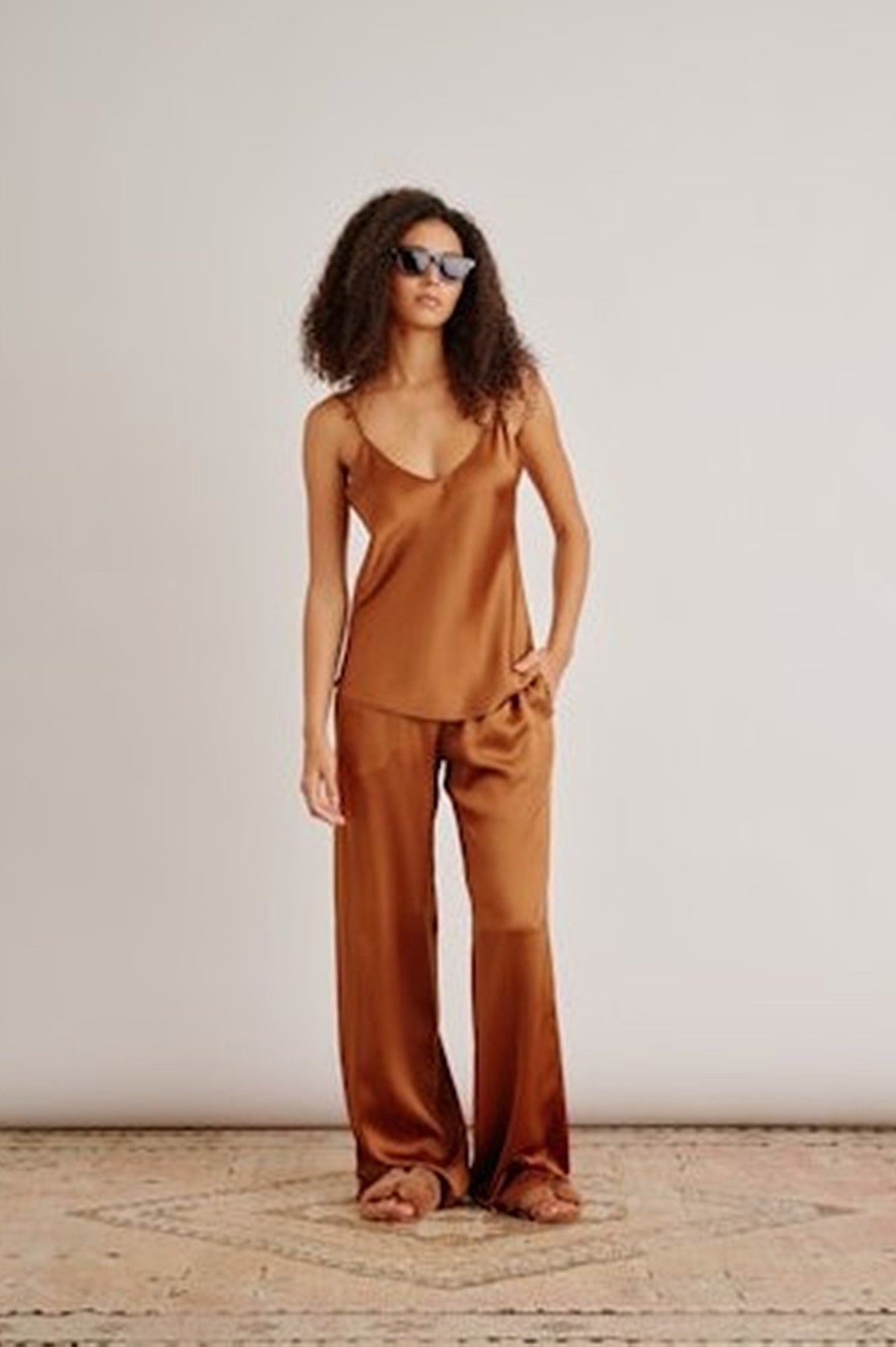 image of a model wearing the Sablyn Gloria Cami and Brynn Pants
