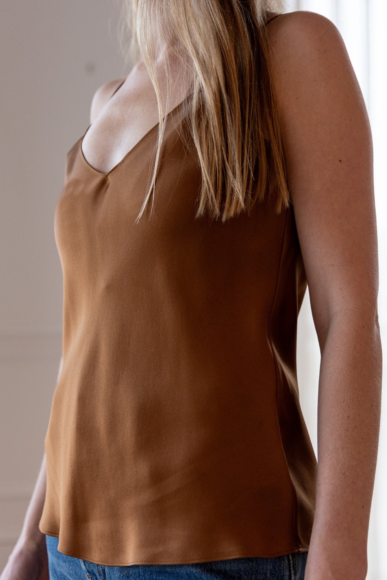 image of a woman wearing the Gloria V Neck Camisole
