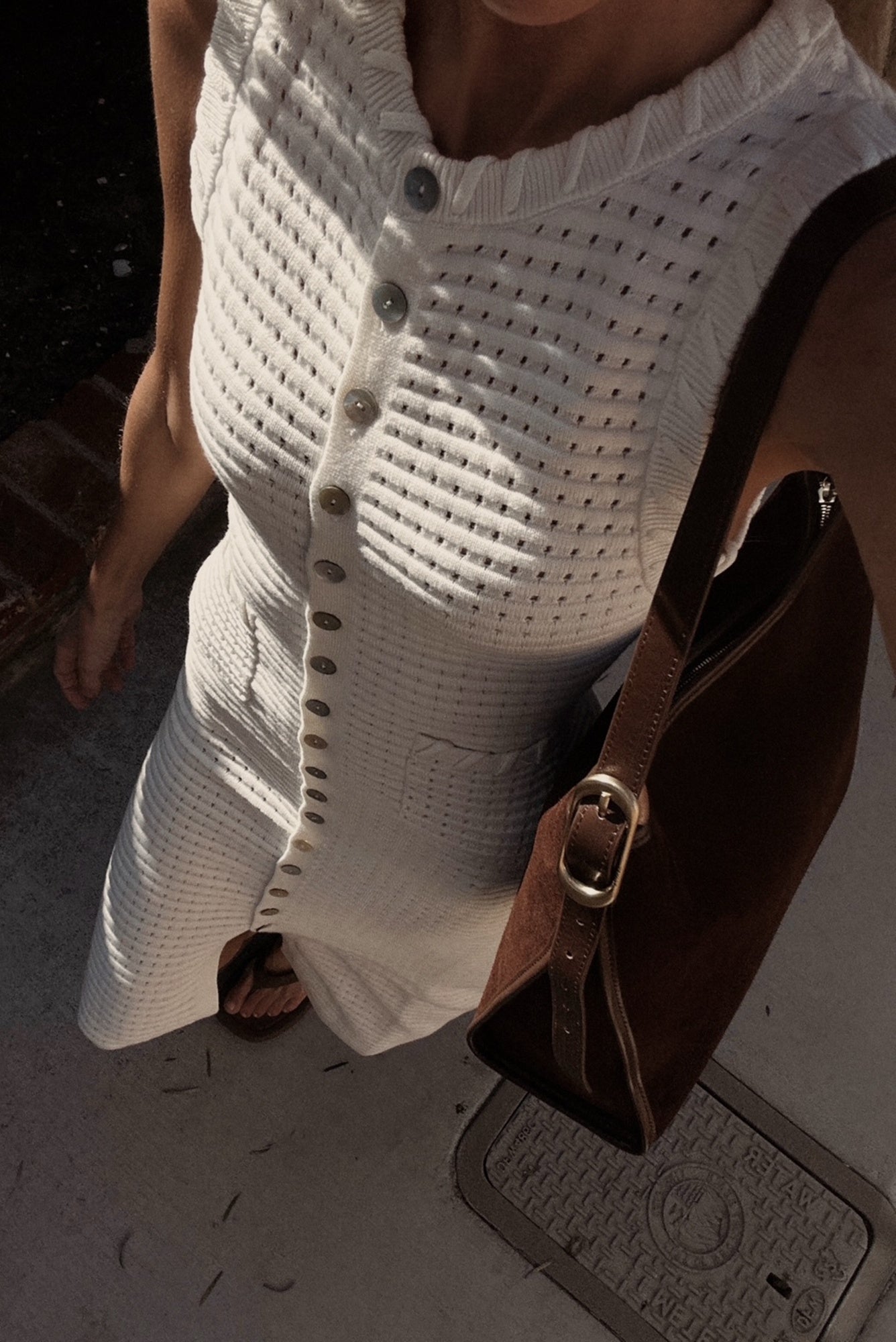 close up image of a woman wearing the Sancia Kamila Knit Dress