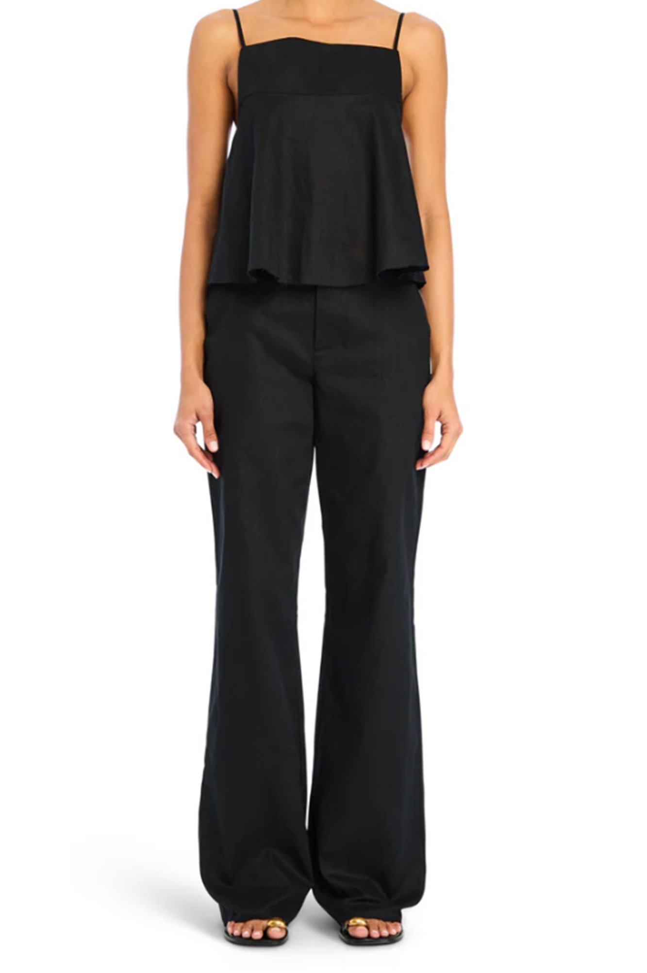 Black sleeveless top and wide-leg pants on a white background