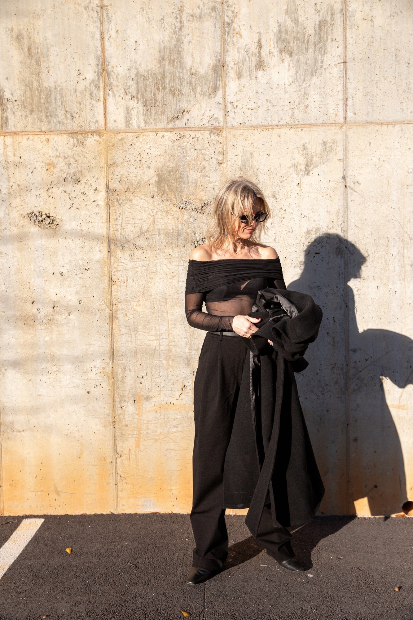 image of a woman wearing the Seroya rosa top and sonya pants