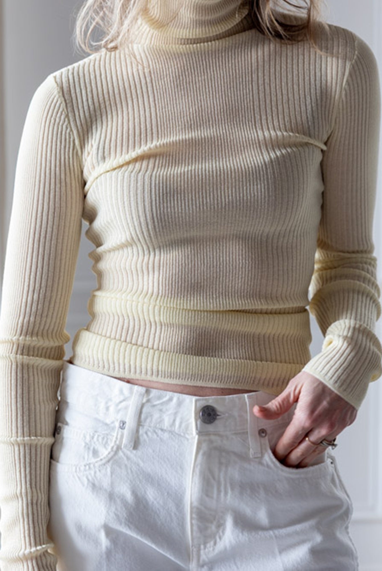 image of a woman wearing the Seroya Belen Top and Amo marcenia Slouchy Bootcut Jeans