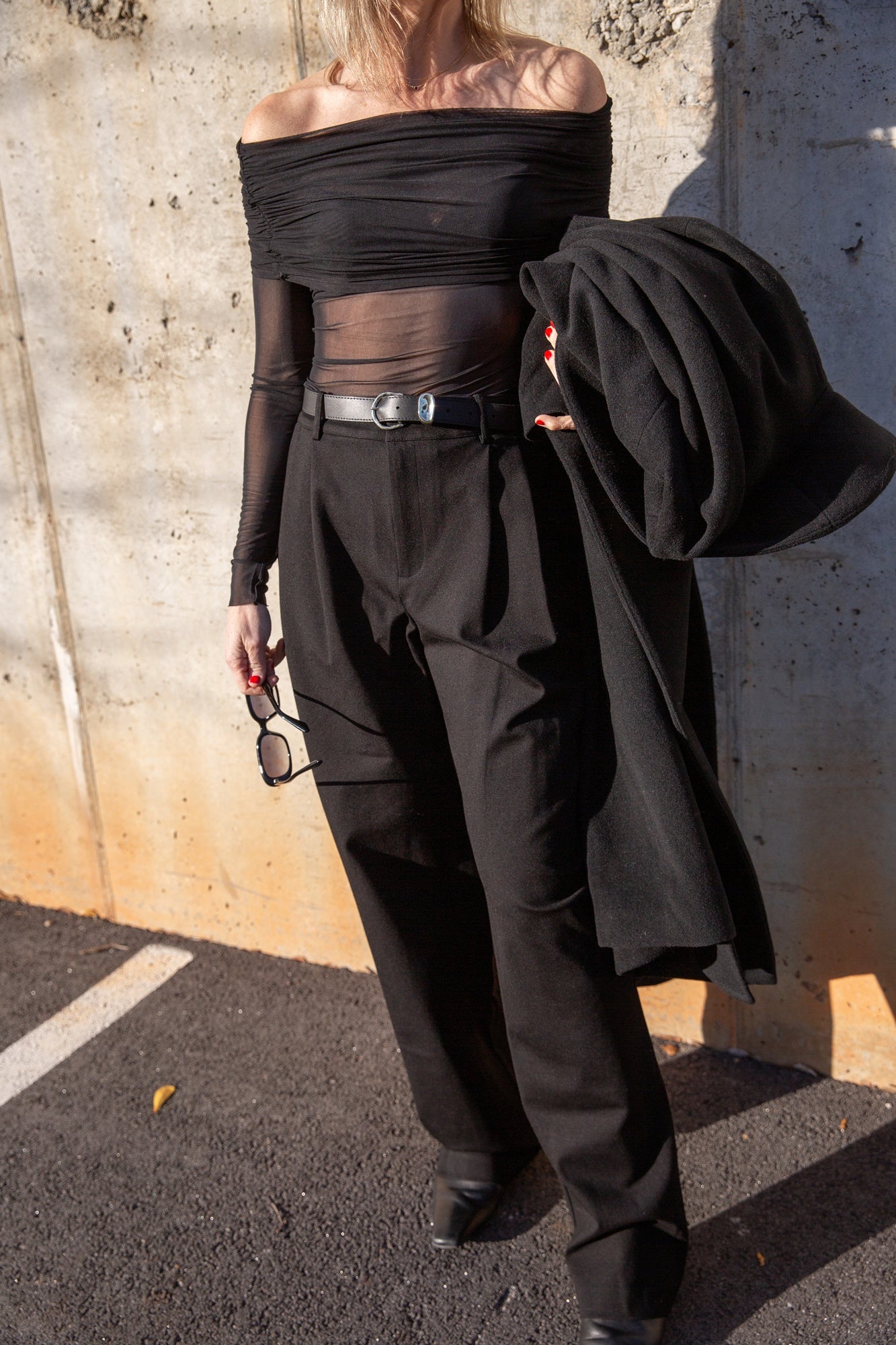 image of a woman wearing the seroya rosa top and sonya pants