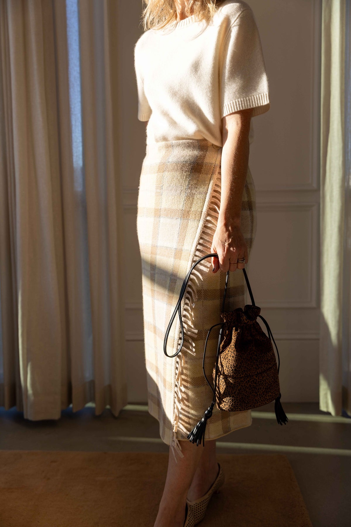 Guest in Residence Tartan Wrap Skirt styled with a Guest in Residence Soft Goat sweater and Hunting Season handbag, view 5