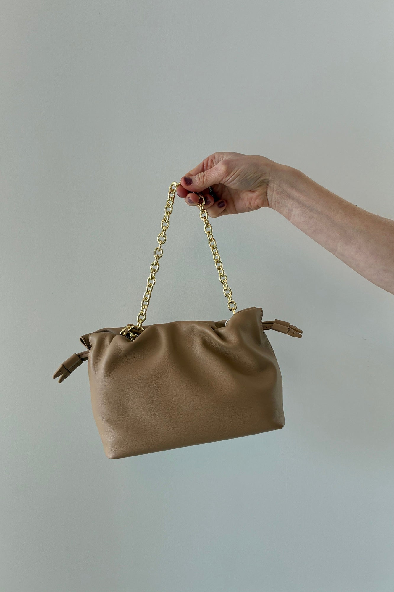 image of the Studio Amelia Alexandra Petite Drawstring Bag in Beige