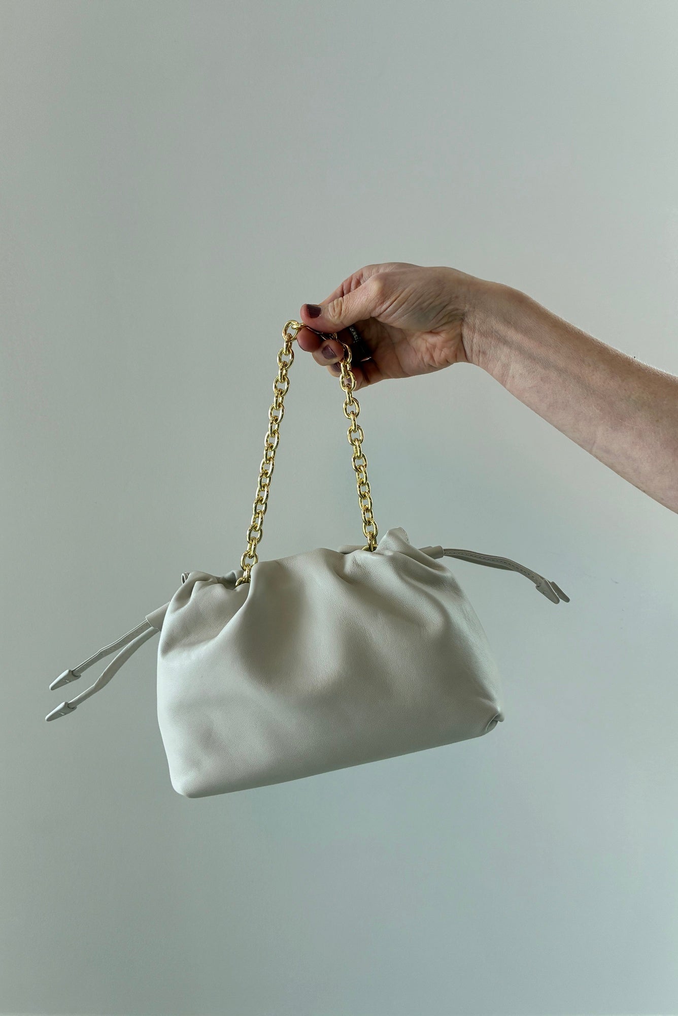 image of the Studio Amelia Alexandra Petite Drawstring Bag in Stone