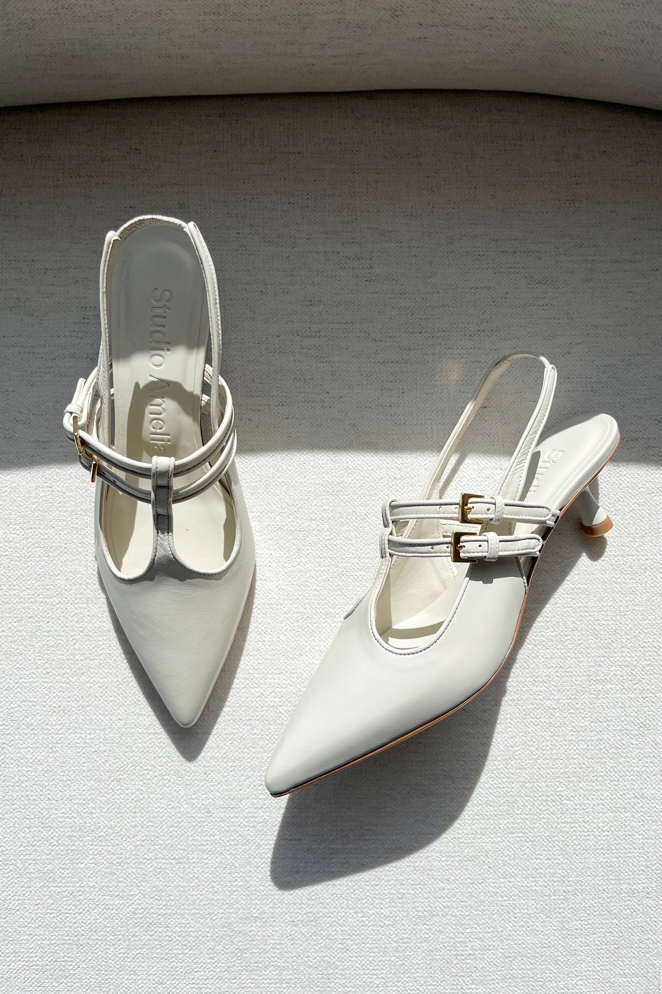 image of the Studio Amelia Alto 50 Slingback Heels in Cream