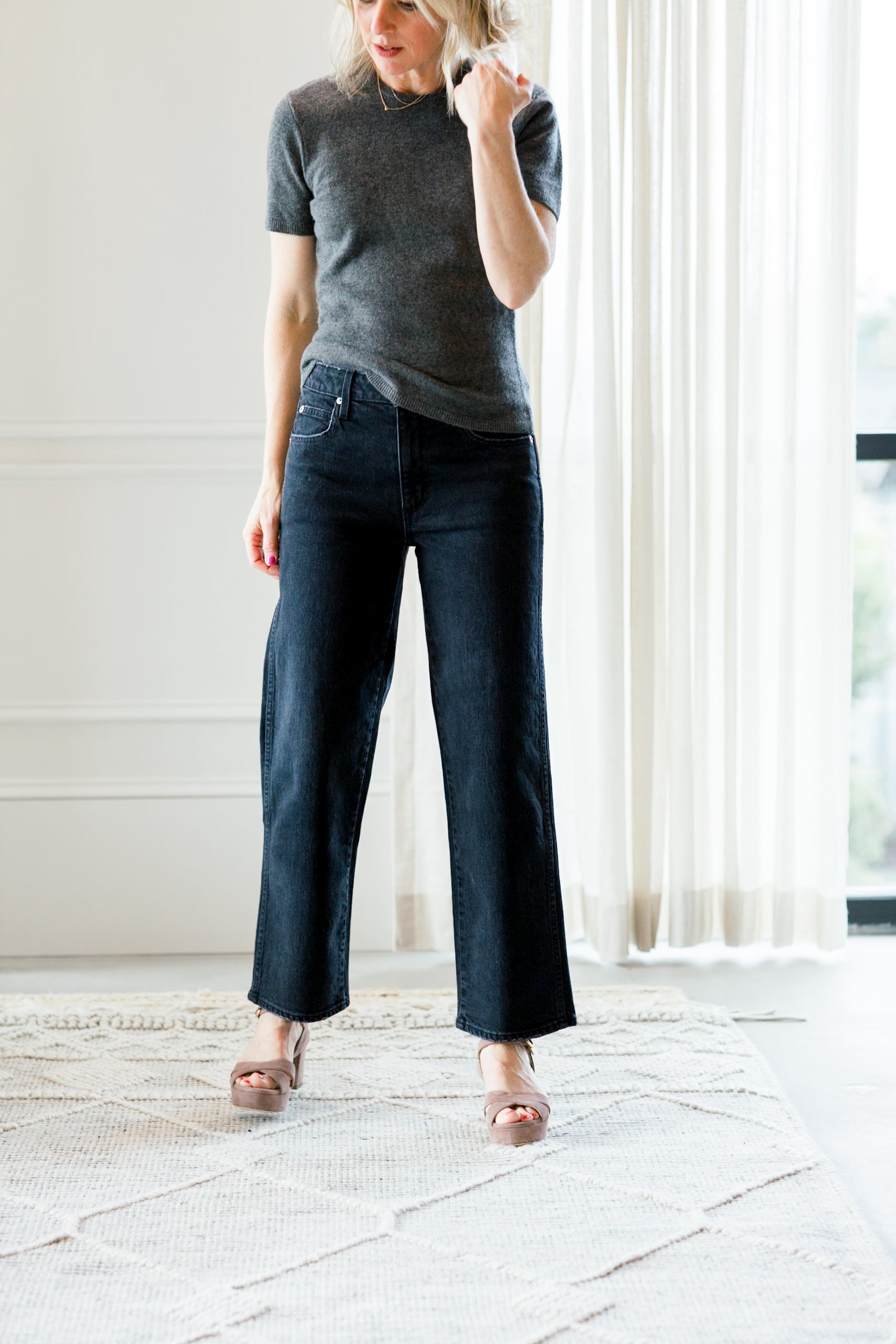 image of a woman wearing the garment como knit tee