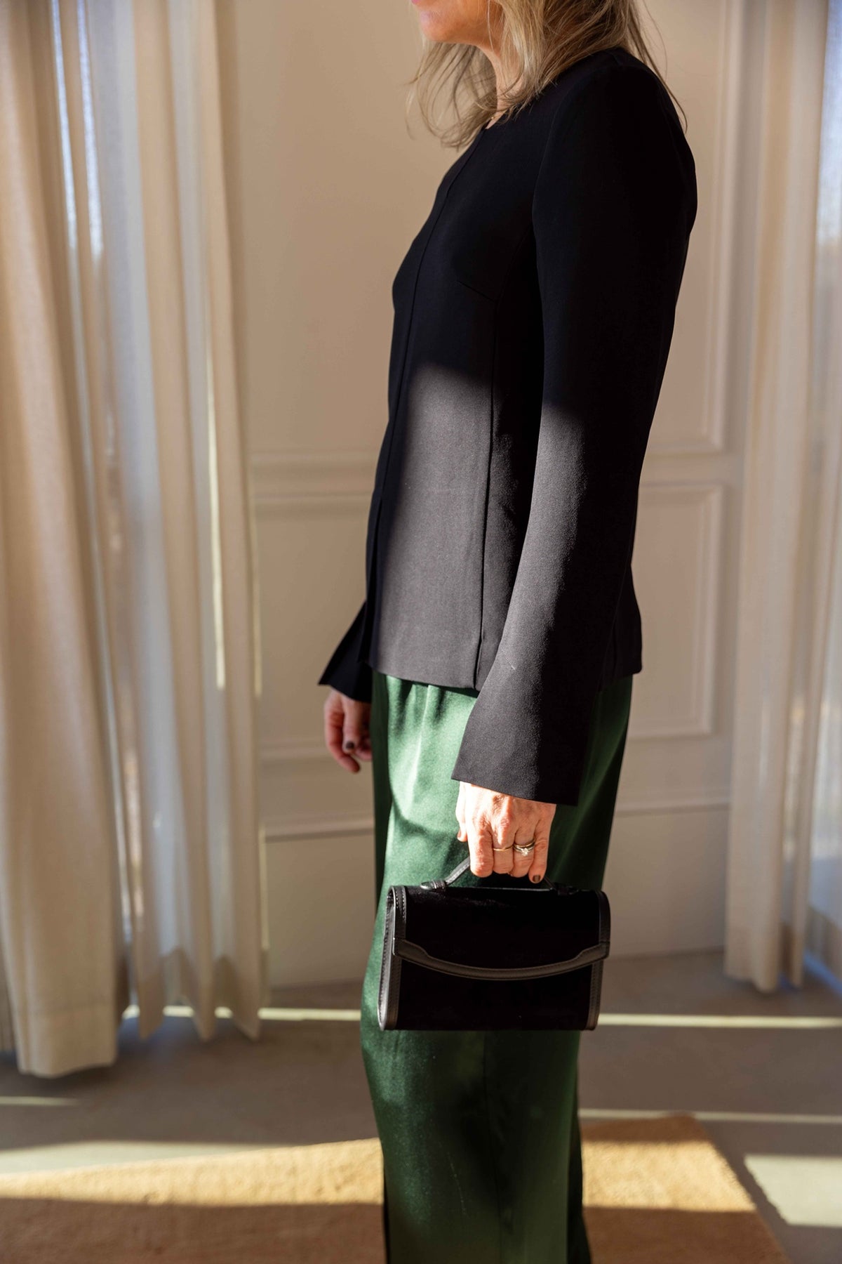 The Garment Crepe Slit Blouse in Black styled with Sablyn Brynn pants and a Hunting Season handbag, view 3