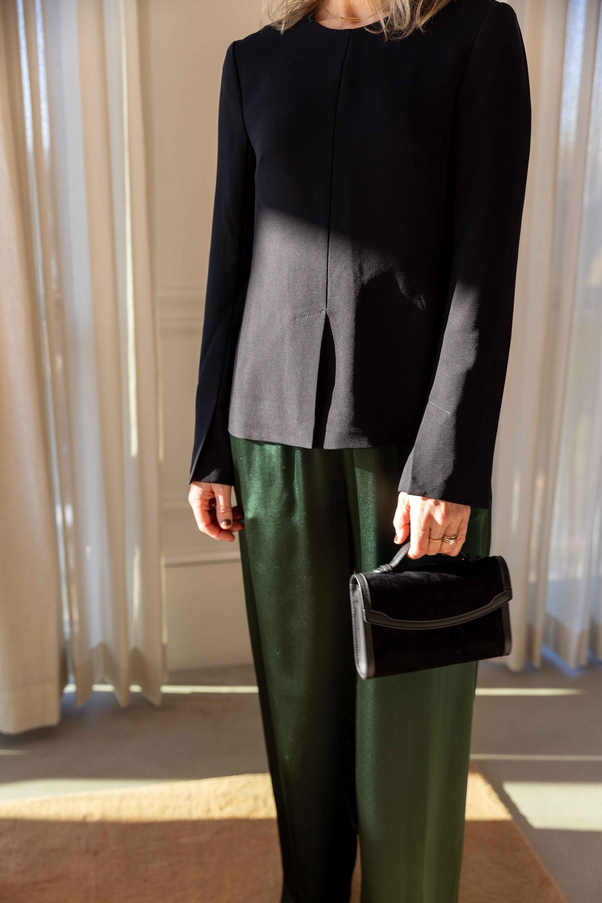The Garment Crepe Slit Blouse in Black styled with Sablyn Brynn pants and a Hunting Season handbag, view 4