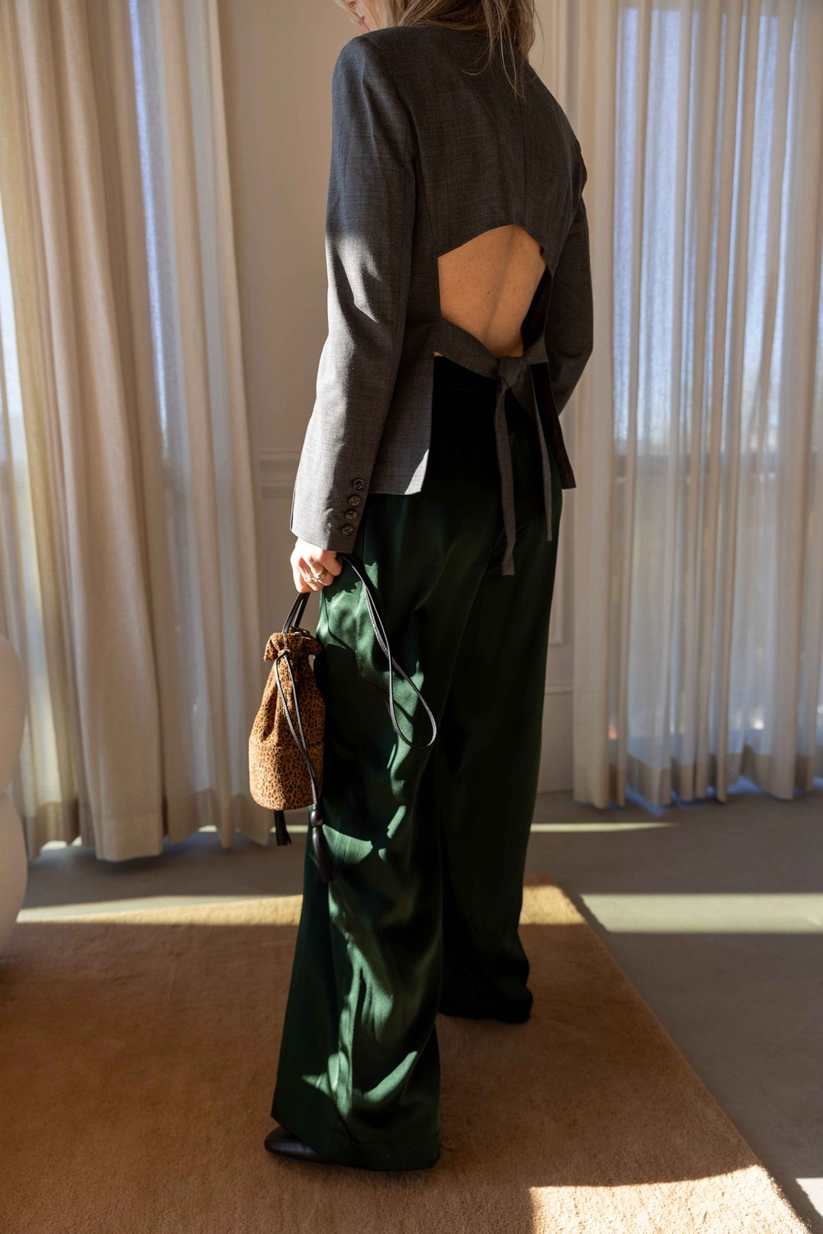The Garment Grand Back Blazer styled with Sablyn Brynn pants and a Hunting Season handbag, view 4
