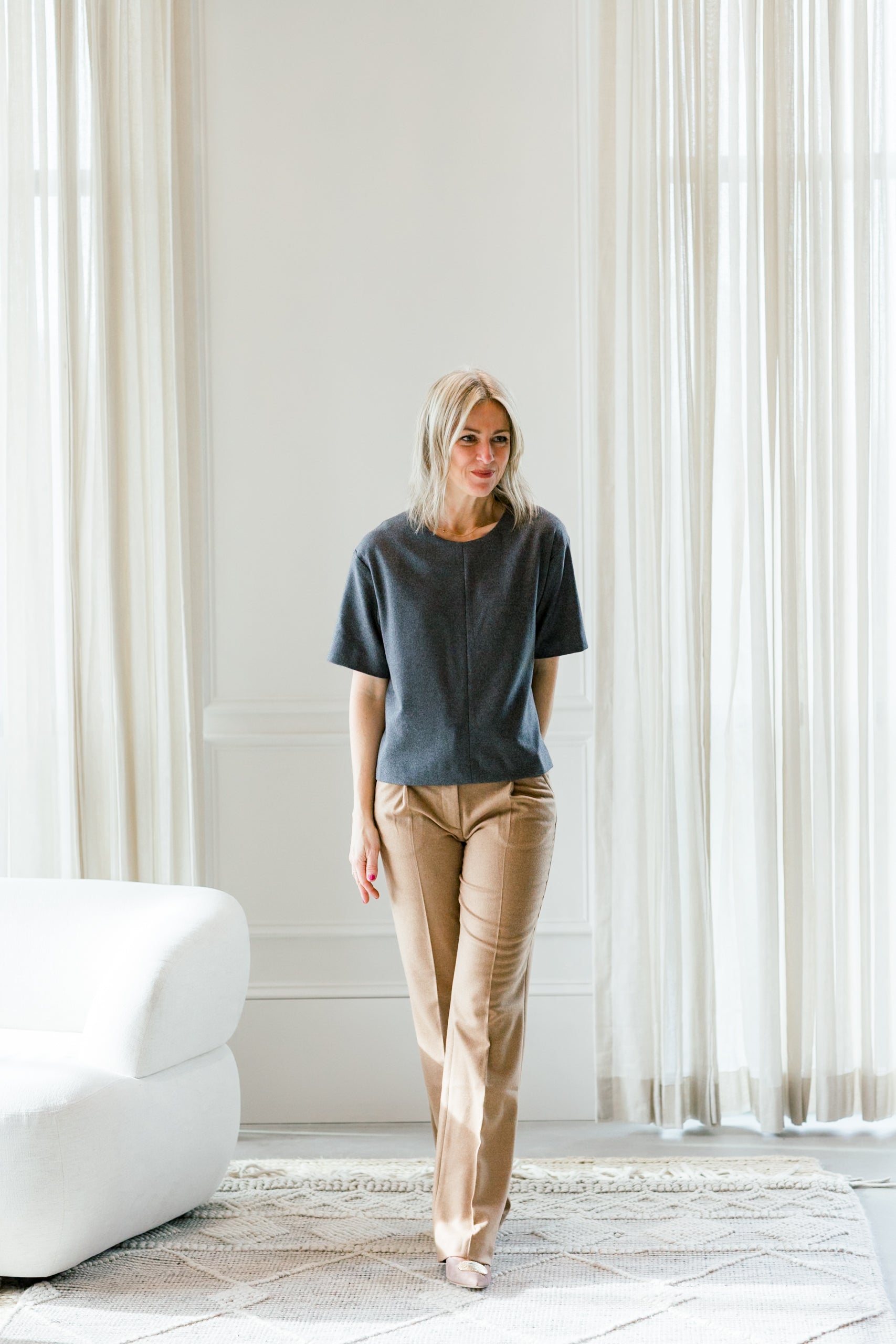 image of a woman wearing the garment mitch top and pants
