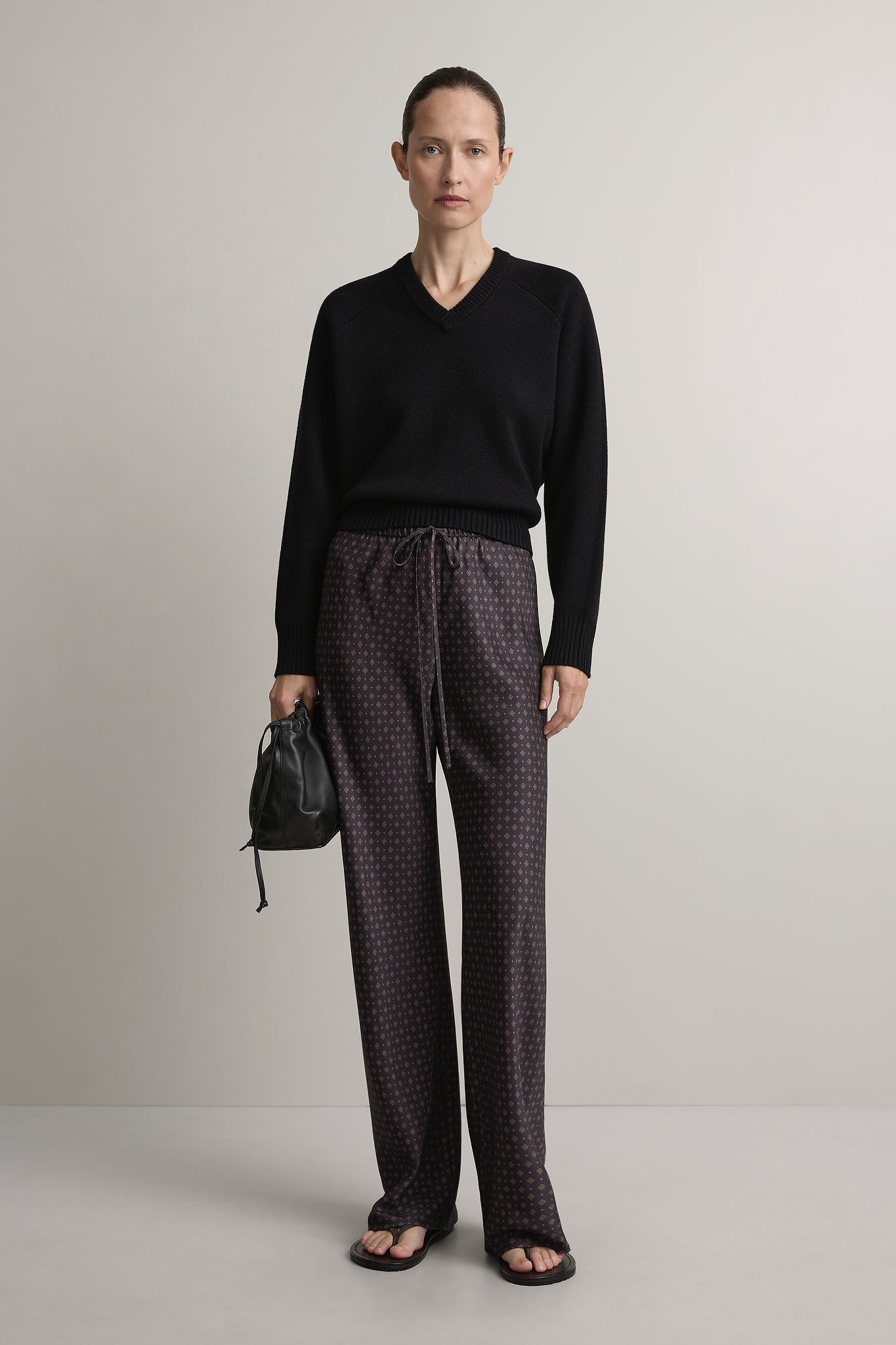 Woman wearing A Emery Estee Bias Pant in Ink Foulard against a neutral background