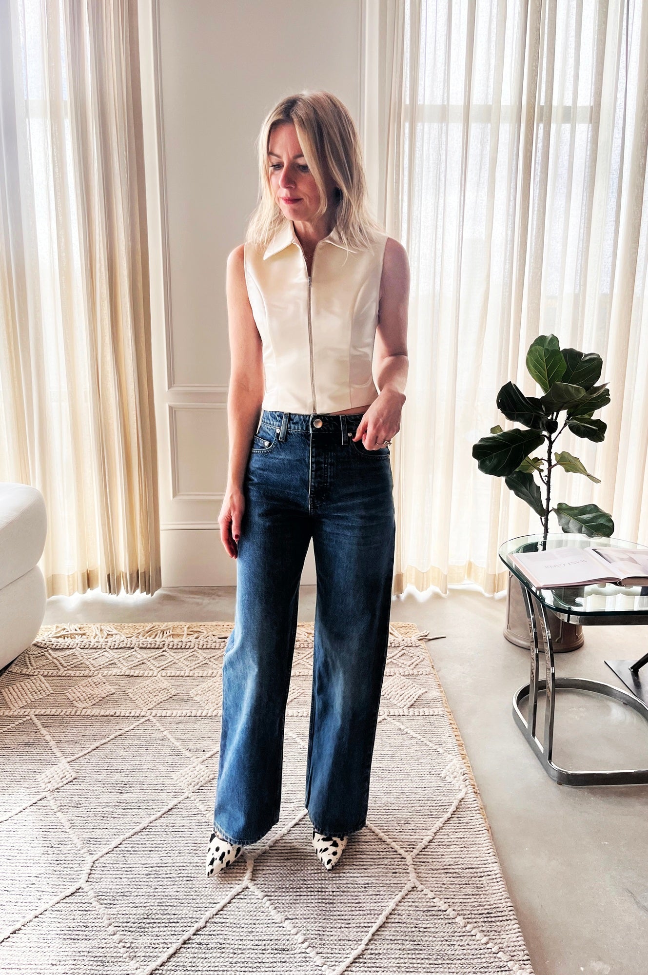 image of a woman wearing the Alfie Christy Top and Sablyn Sammy Jeans