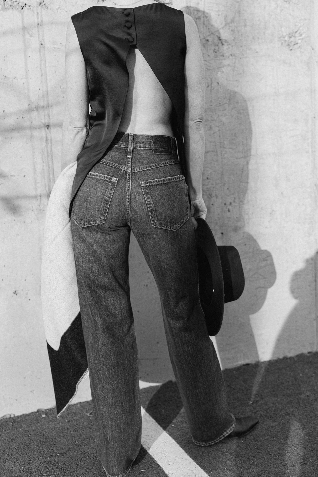 back image of the House of Dagmar open back blouse and Amo Annette Jeans in persuasion