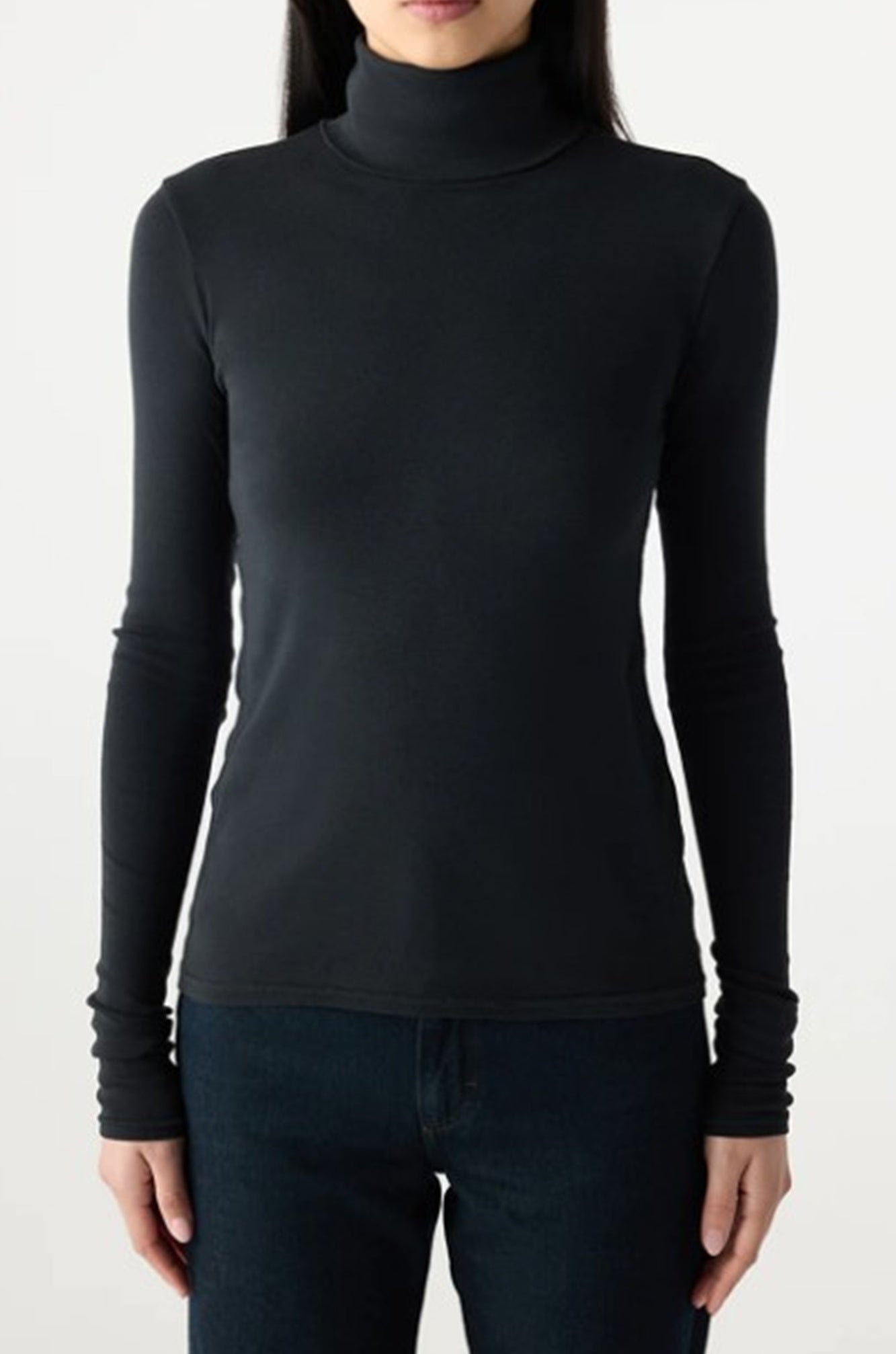 image of a model wearing the Amo Reese Turtleneck in Black
