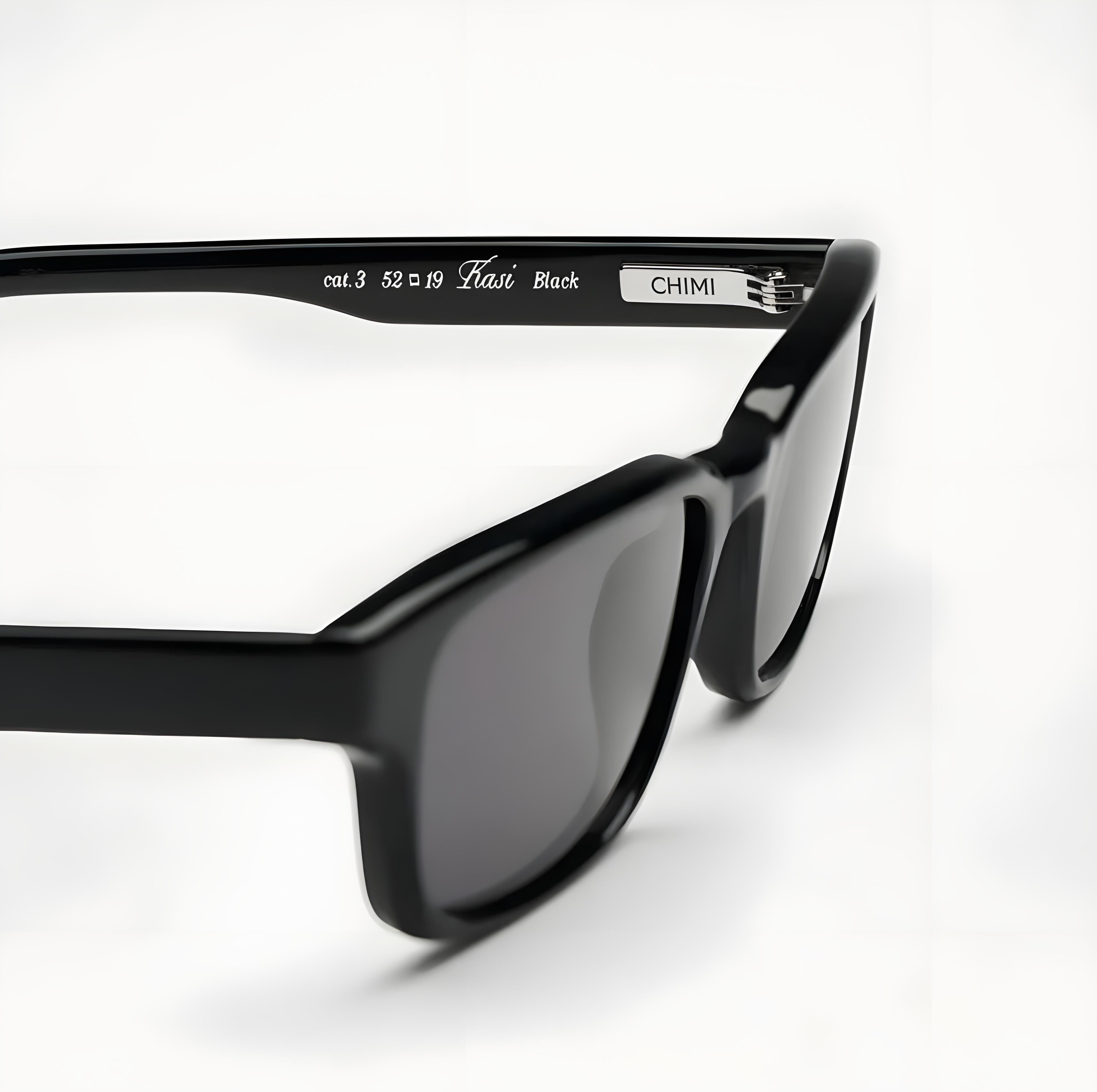 black sunglasses against white background