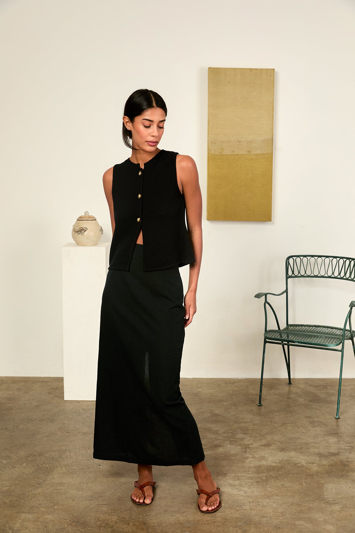 Image of a woman wearing the Ciao Lucia Enea Vest