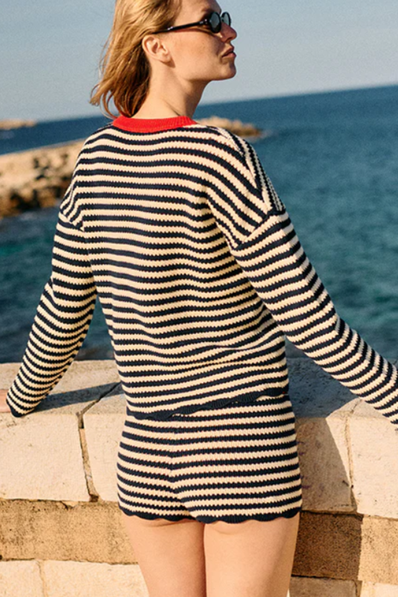 Back image of a woman wearing the Ciao Lucia Febo Top
