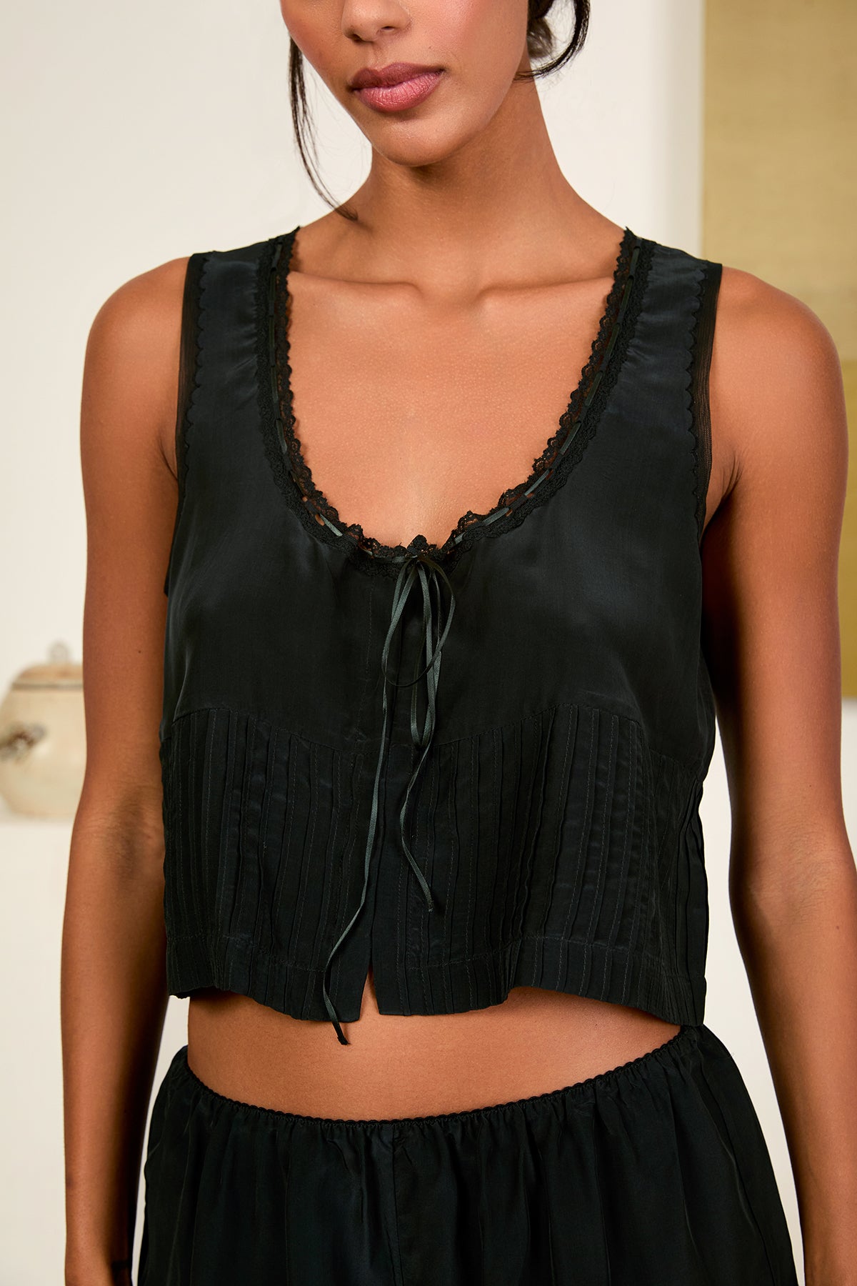 Image of a model wearing the Ciao Lucia Lottie Top