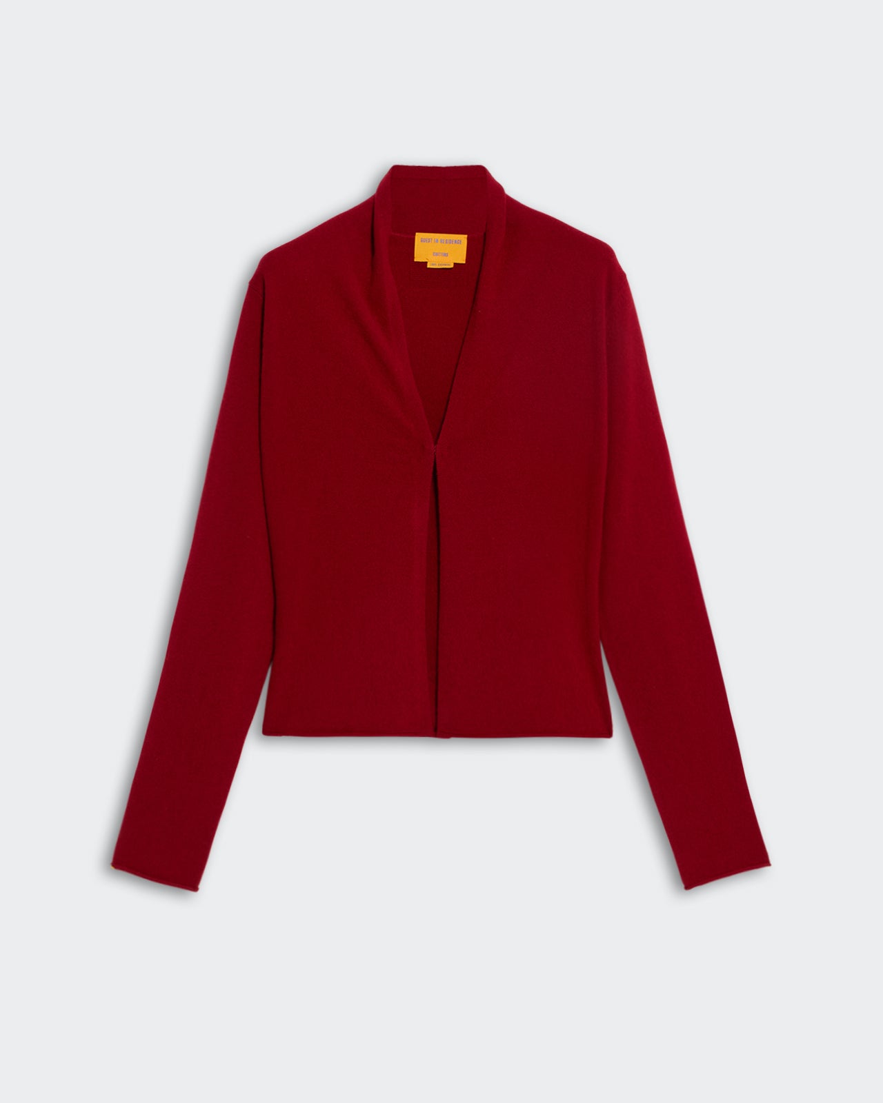 image of a woman wearing the Guest in Residence Stealth Cardigan in Red