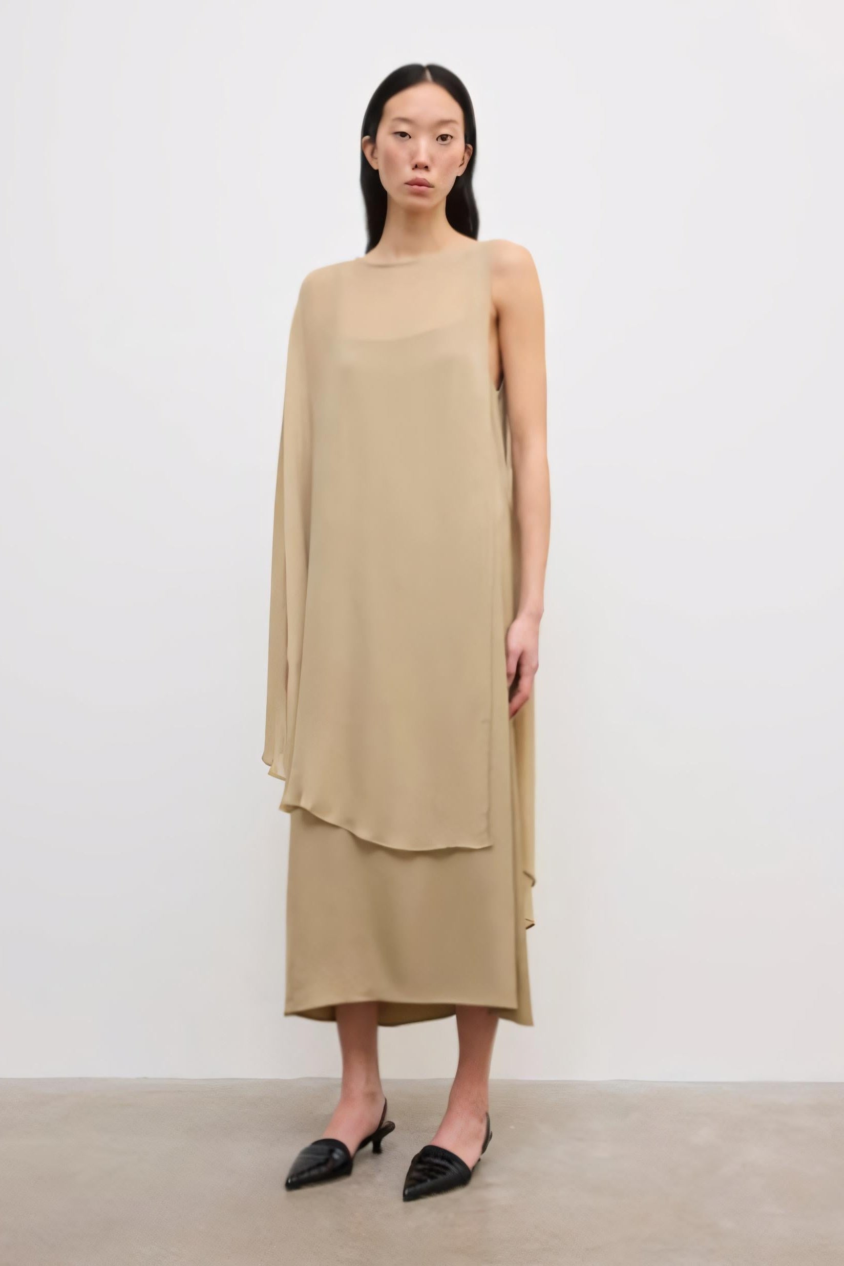 image of a model wearing the House of  Dagmar Chiffon Cape Dress