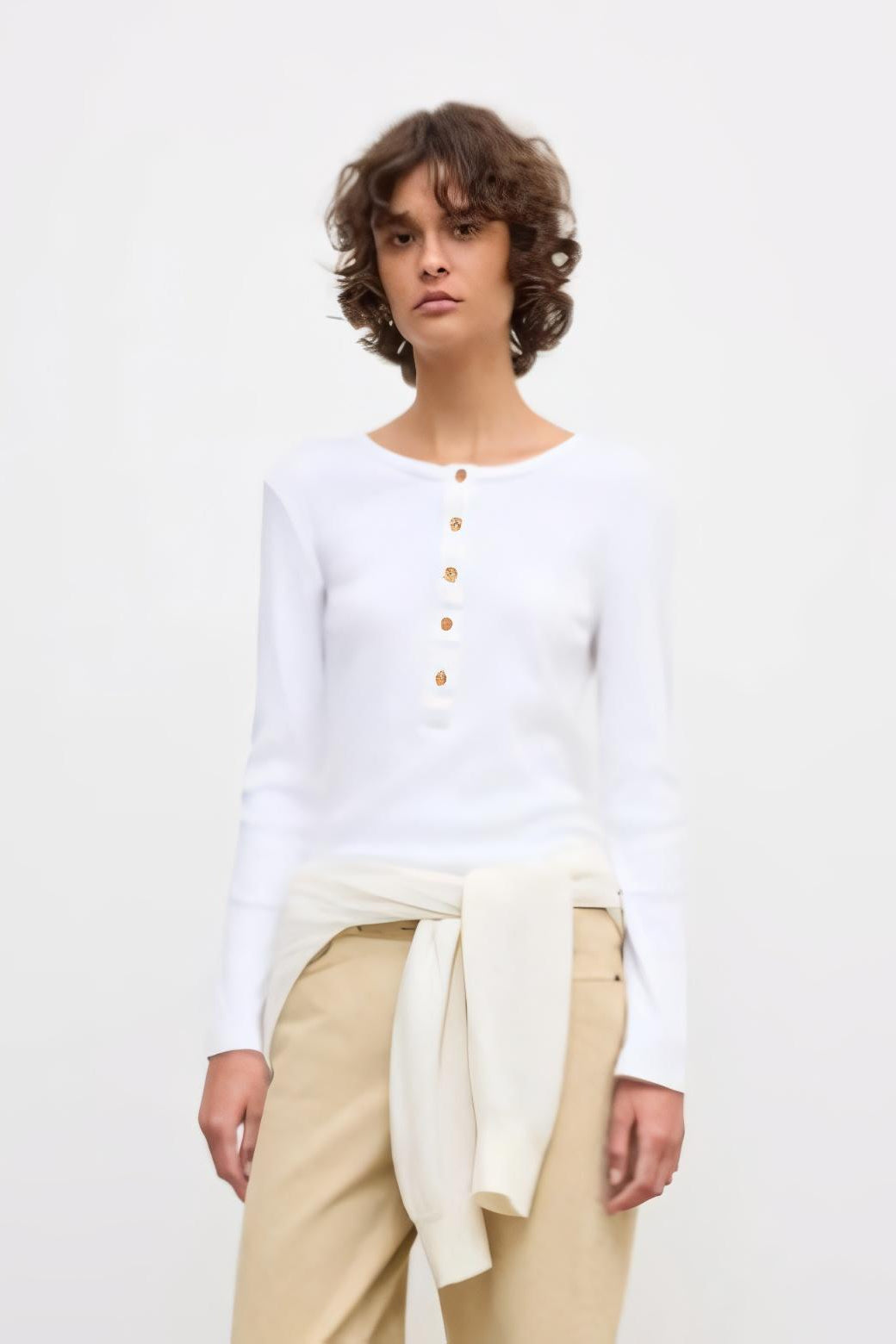 image of a model wearing the House of Dagmar Henley Top