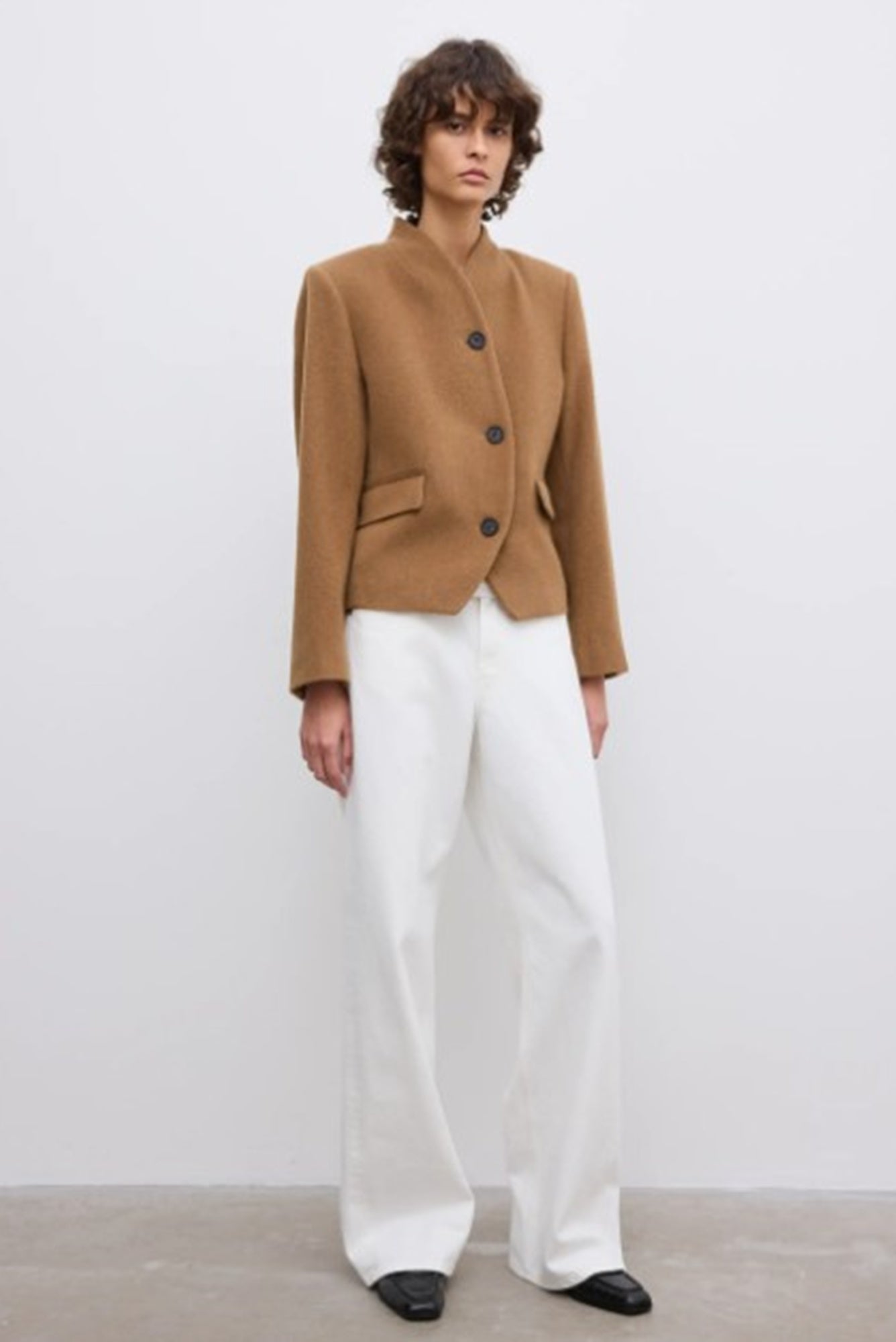 Image of a model wearing the House of Dagmar Short Curved Jacket