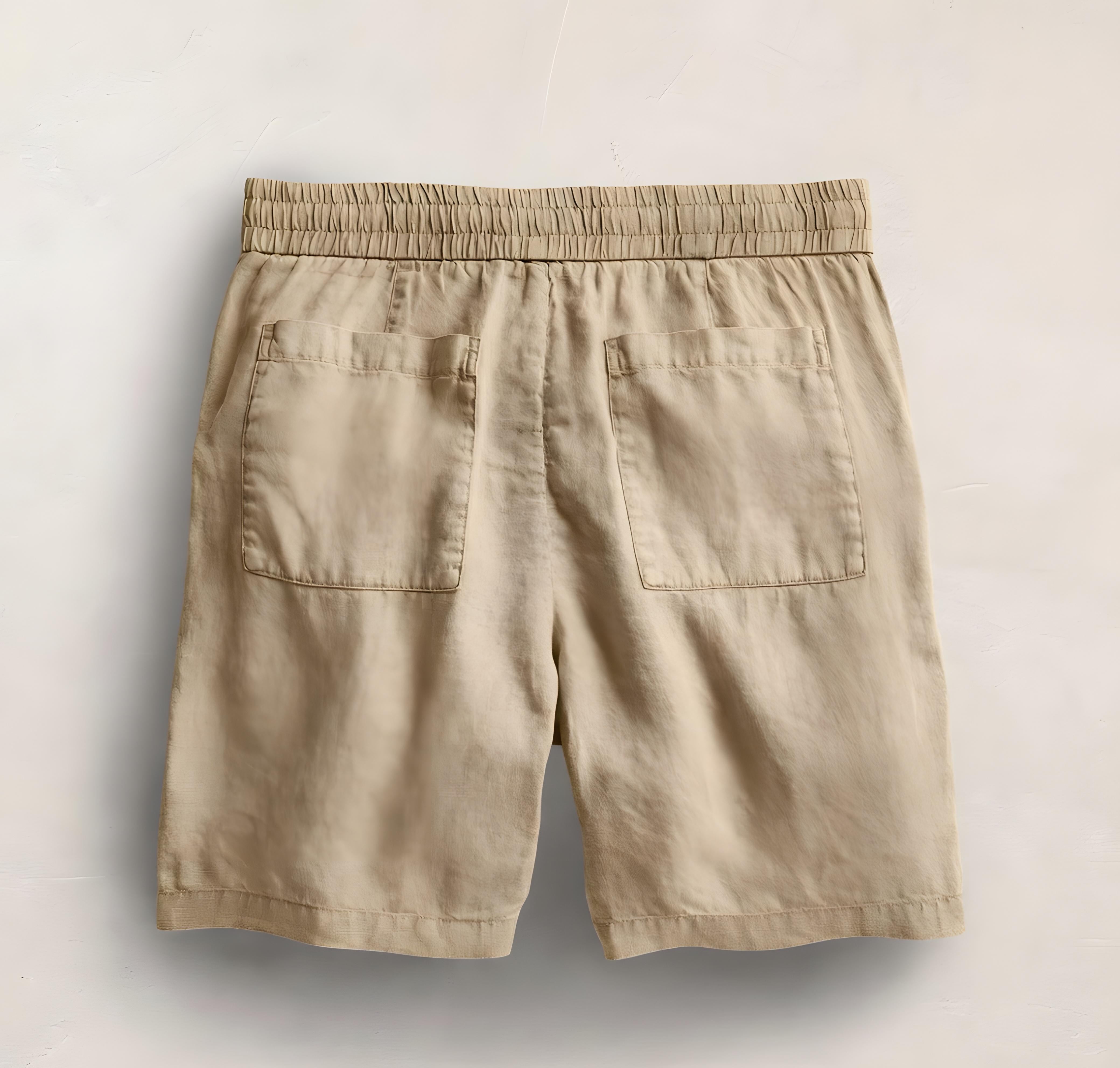 James Perse Lightweight Linen Relaxed Short in Light Khaki Pigment against a white background