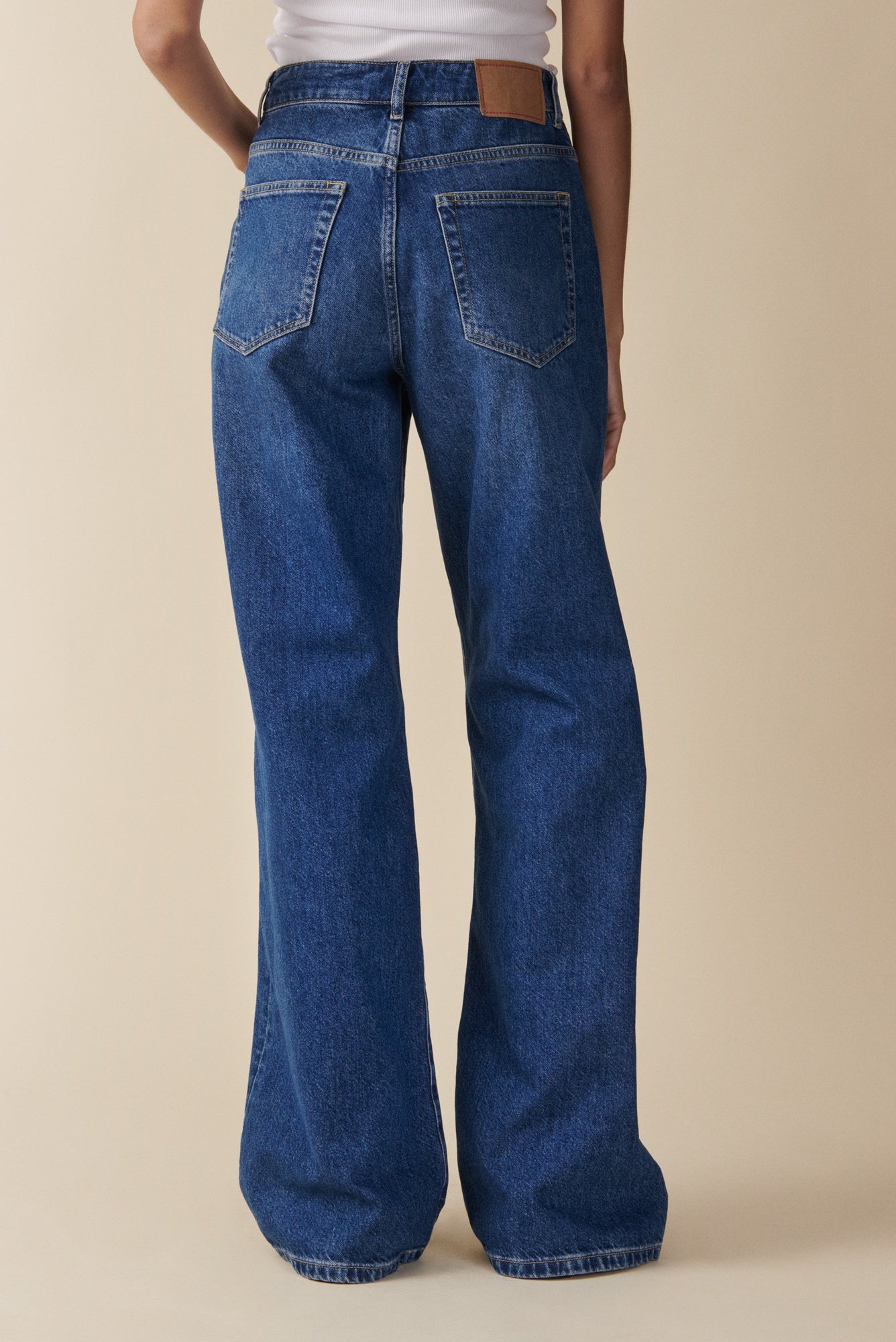 back image of a model wearing the Jeanerica Belem Jeans in Vintage 62
